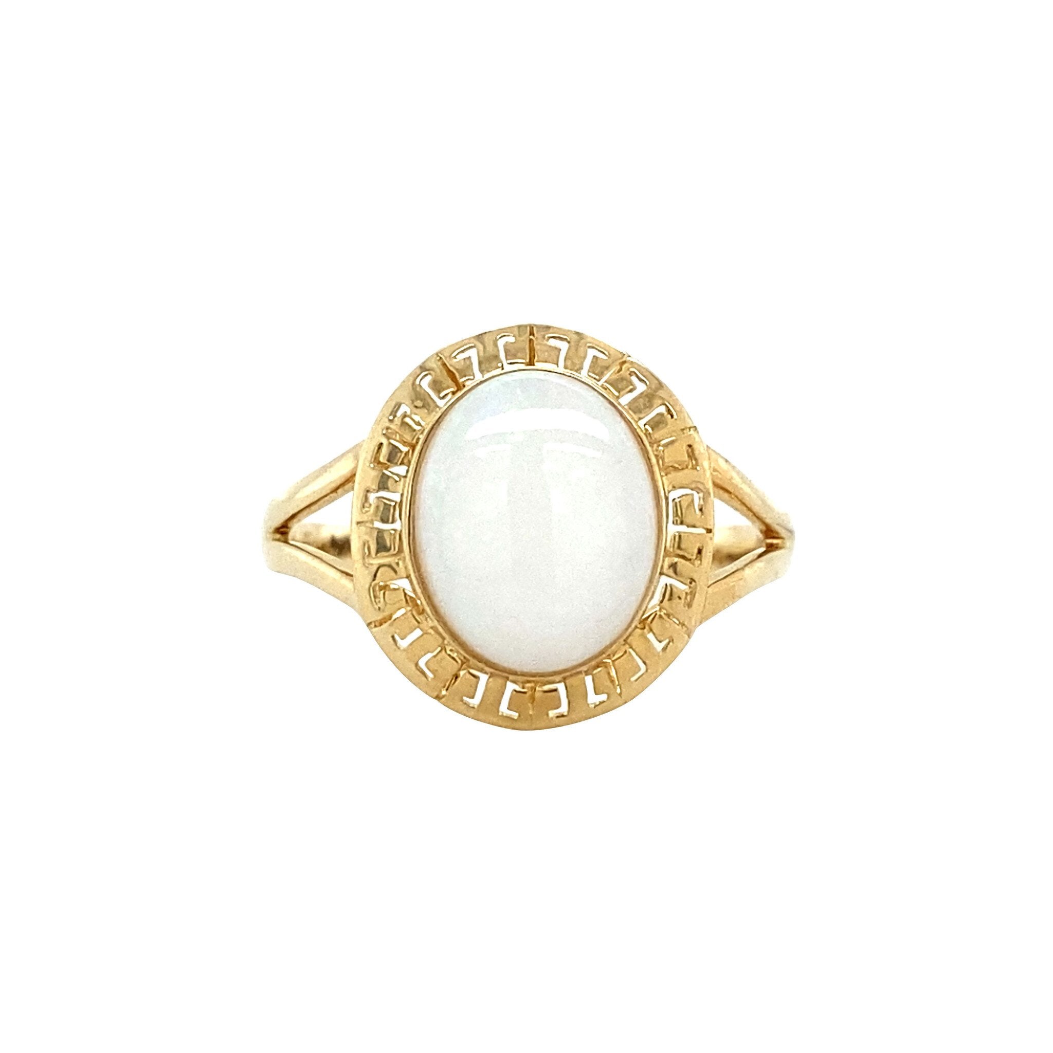 Gouden vintage ring met opaal 14 krt