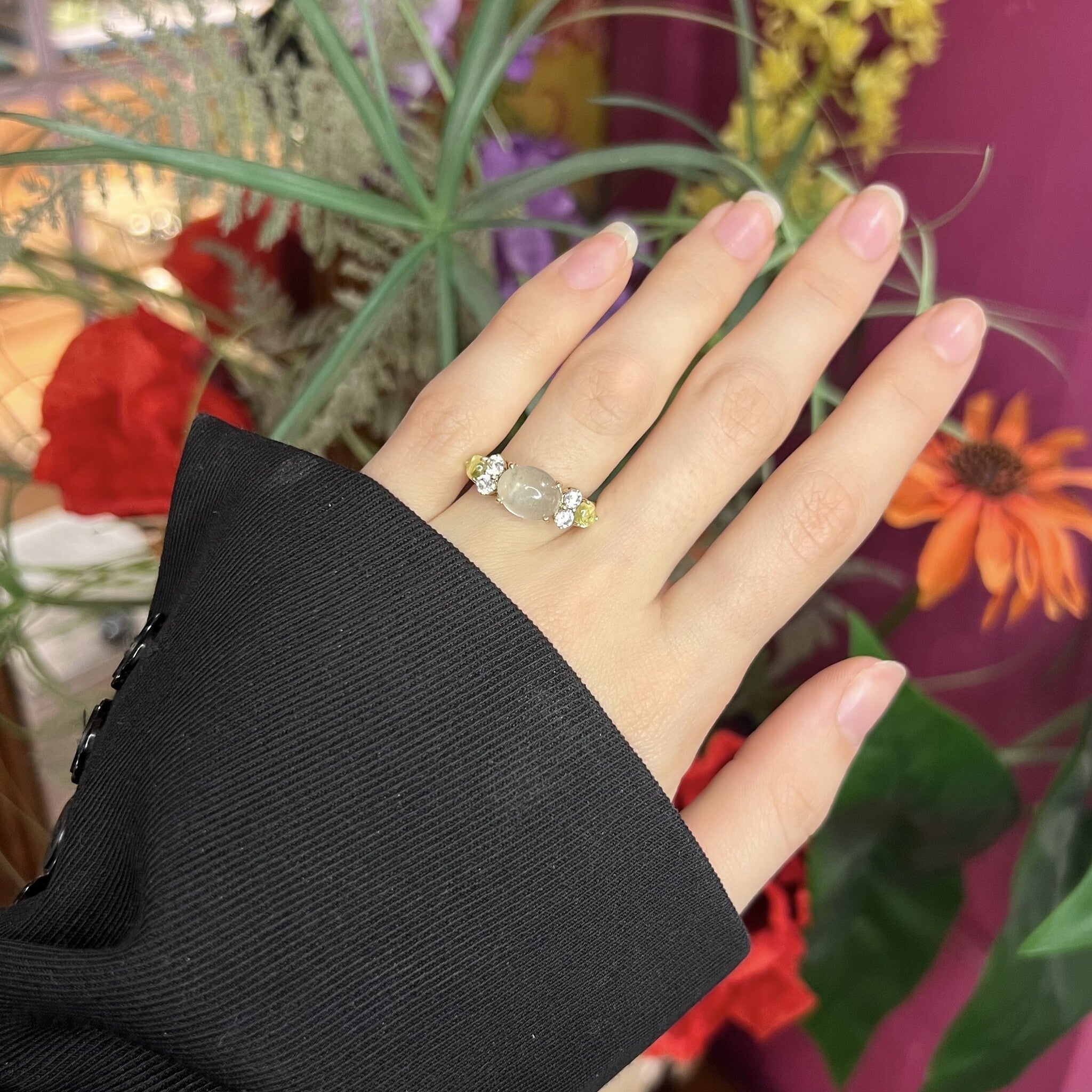 Gold ring with moonstone, zirconia and glass, 14 kt