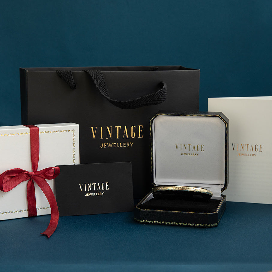 Gold bangle with engraving 14 krt