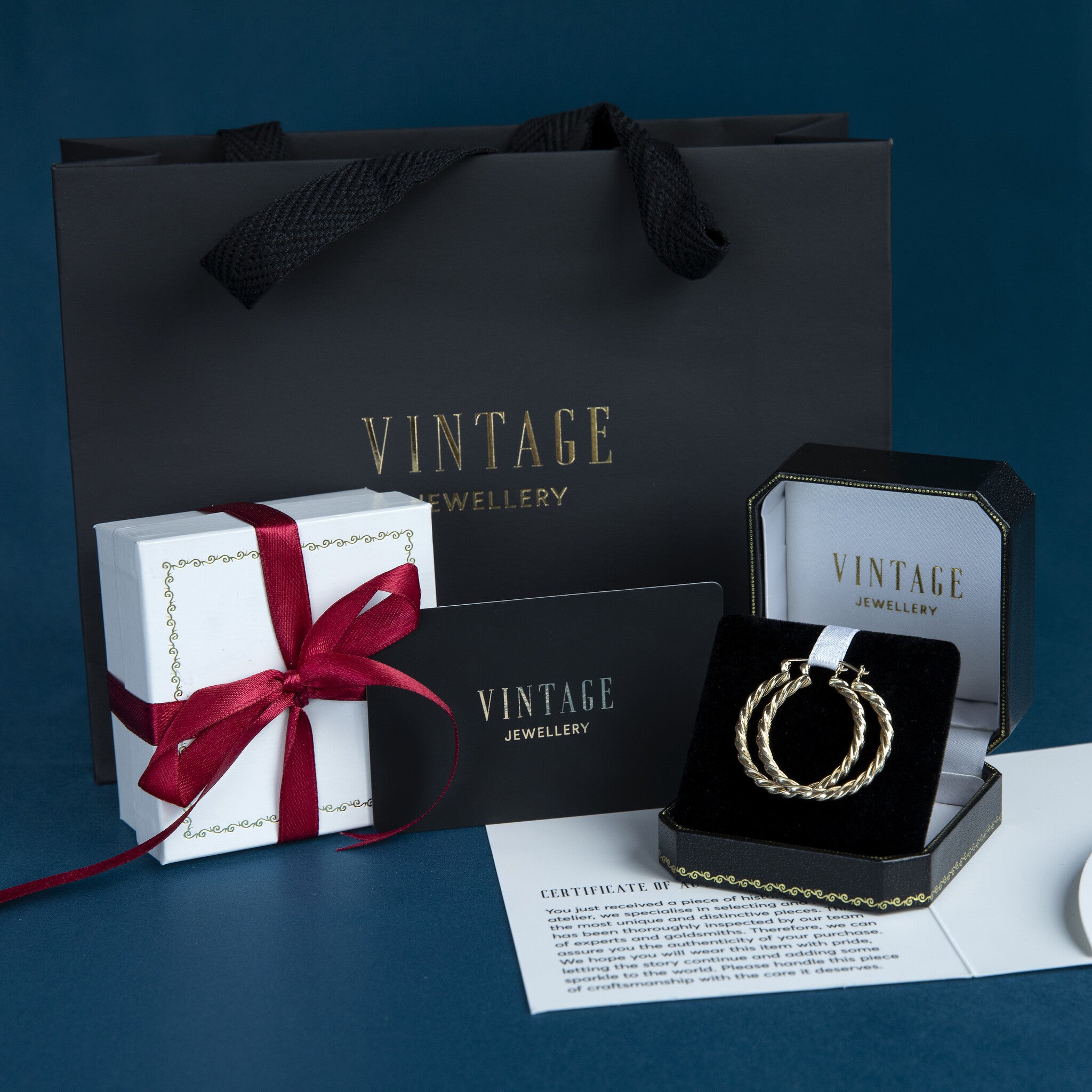 Gouden creolen met diamant en emaille 14 krt