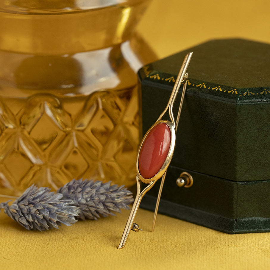 Vintage gold brooch with blood coral, 14 kt