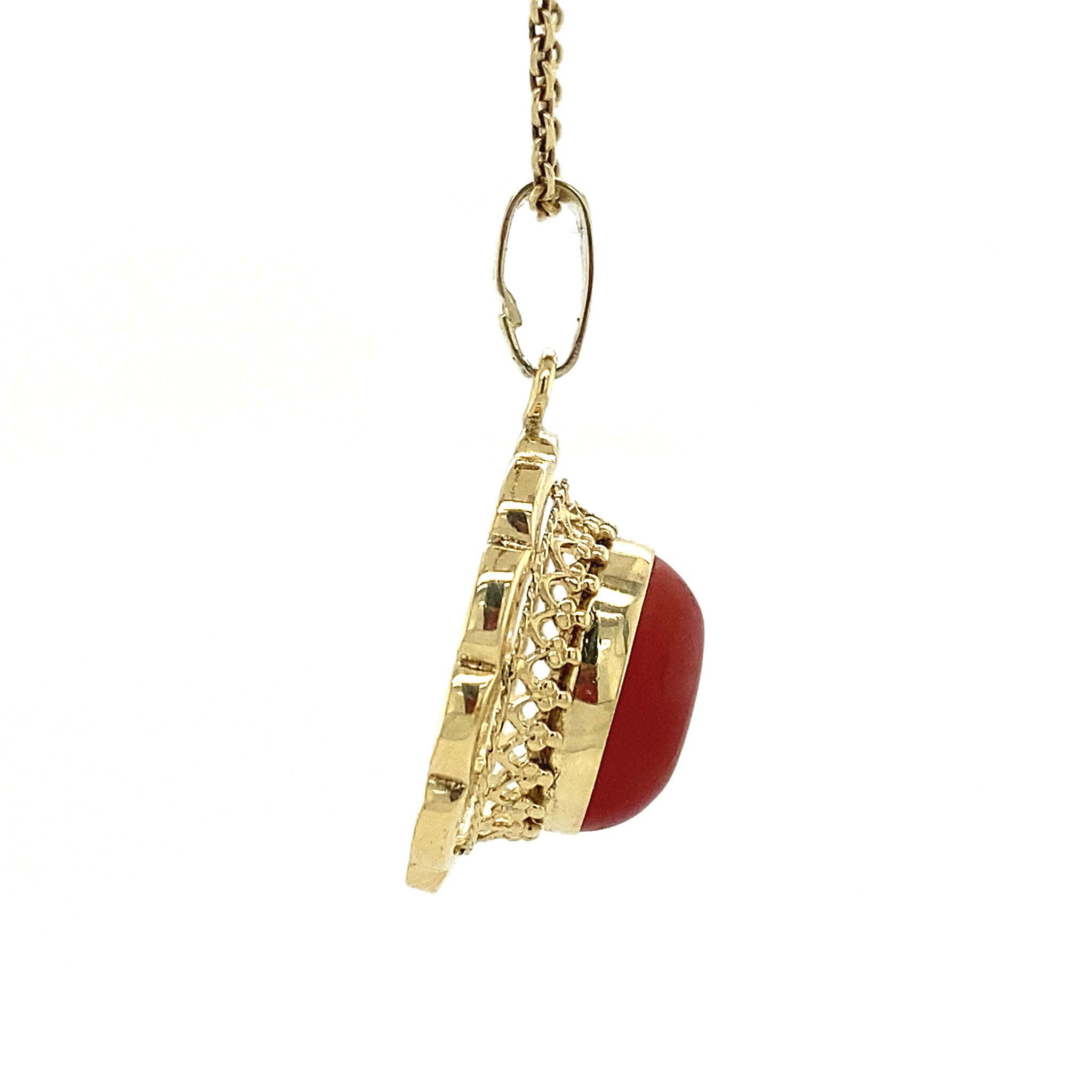 Golden pendant with blood coral 14 kt