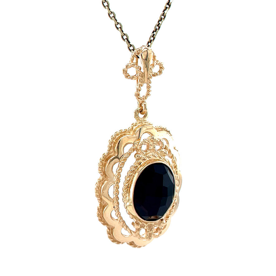Gold vintage pendant with garnet 14 kt