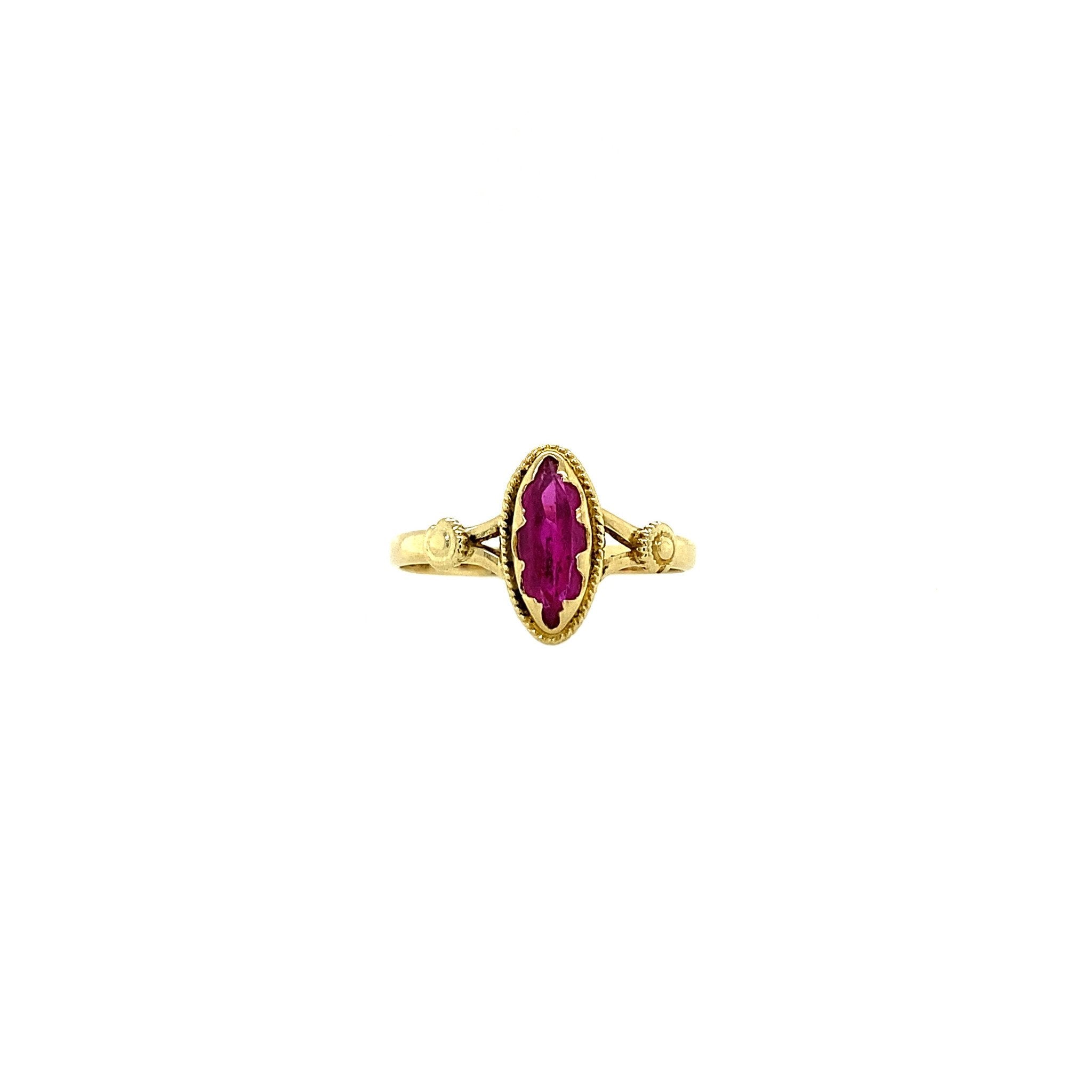 14 kt gold ring with ruby