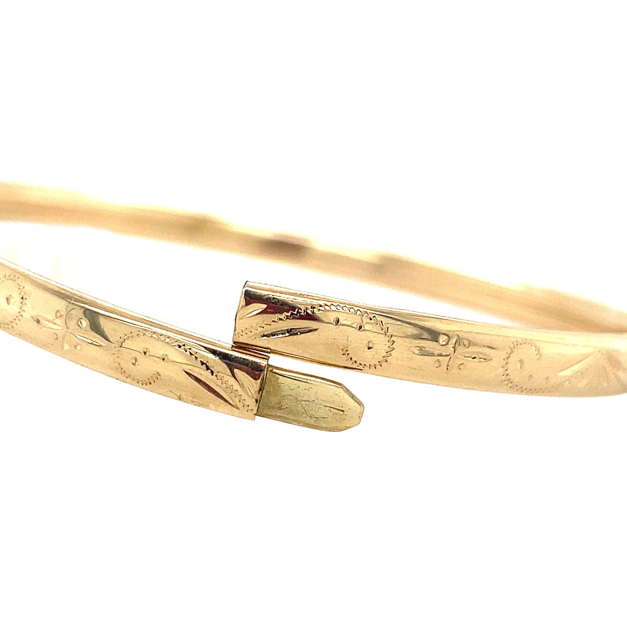 Gouden bangle met gravure 14 krt