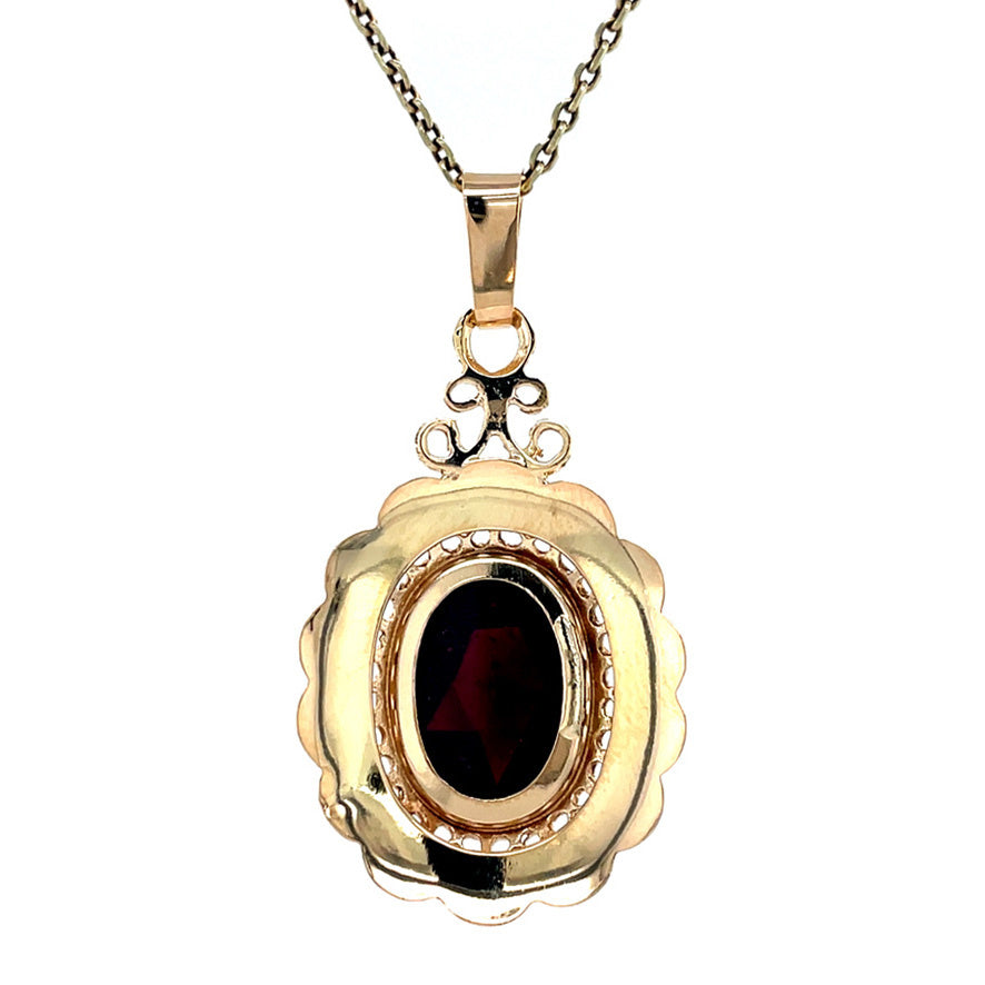 Vintage gold pendant with garnet, 14 kt