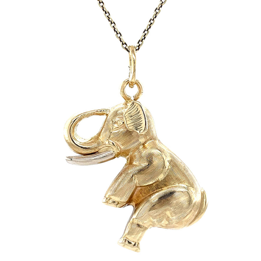 Golden vintage elephant pendant 14 kt