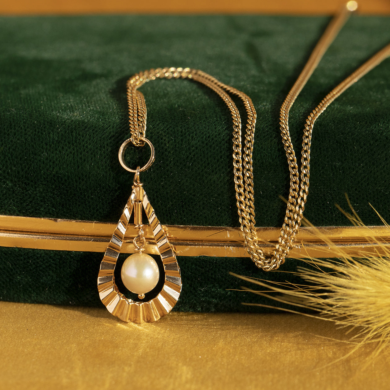 Gouden hanger met parel 14 krt