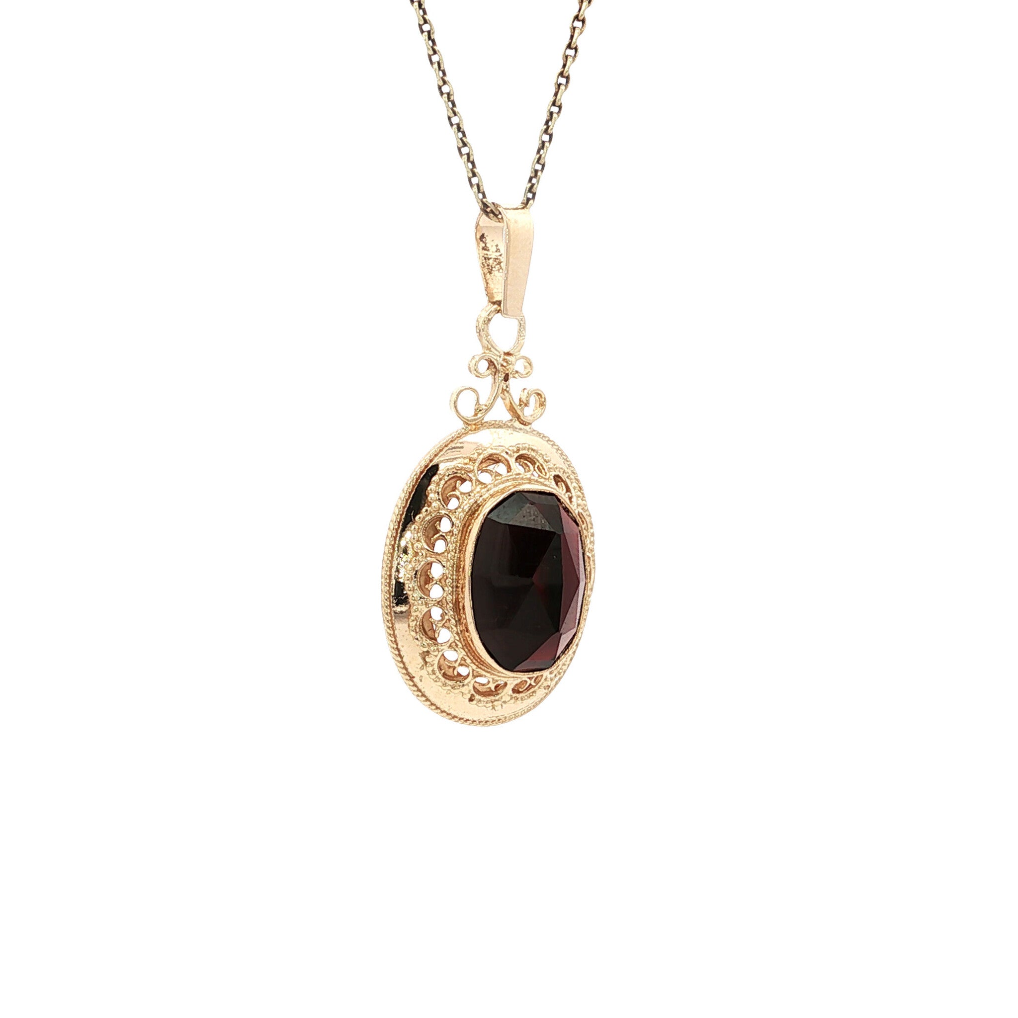Vintage gold pendant with garnet, 14 kt