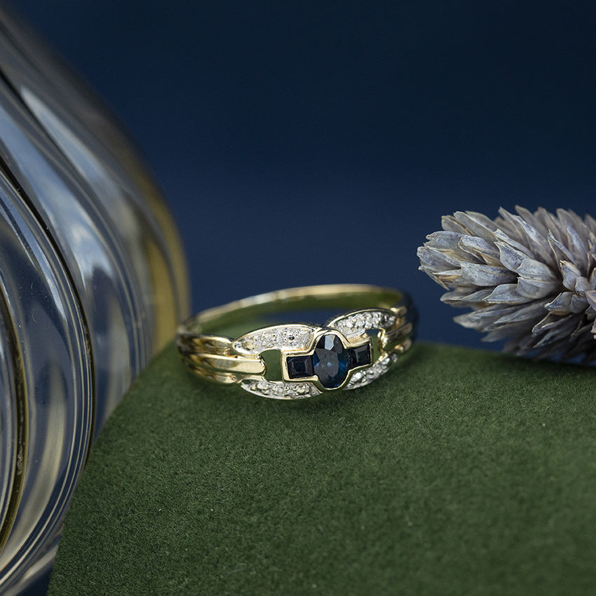 Gouden vintage ring met saffier en diamant 14 kt
