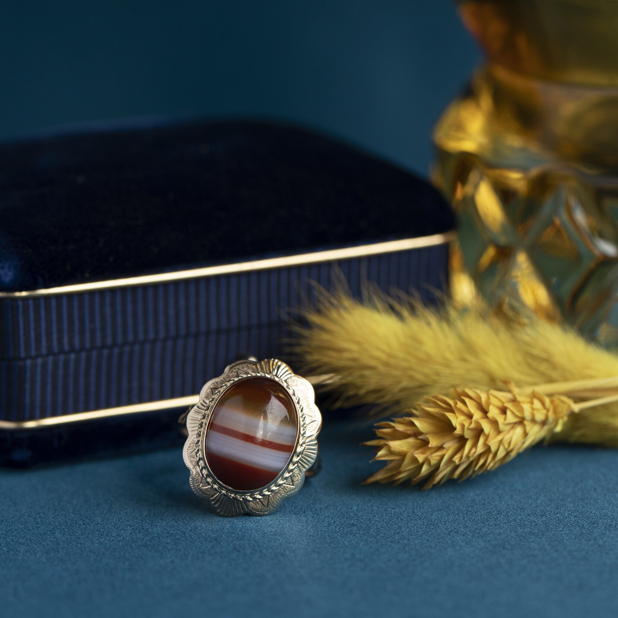 Gouden ring met streepagaat 14 krt