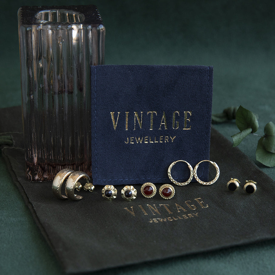 Gouden vintage fantasie oorringen 14 krt
