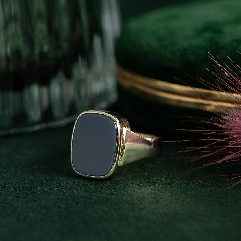 Vintage gold ring with blue low-set stone, 14 kt