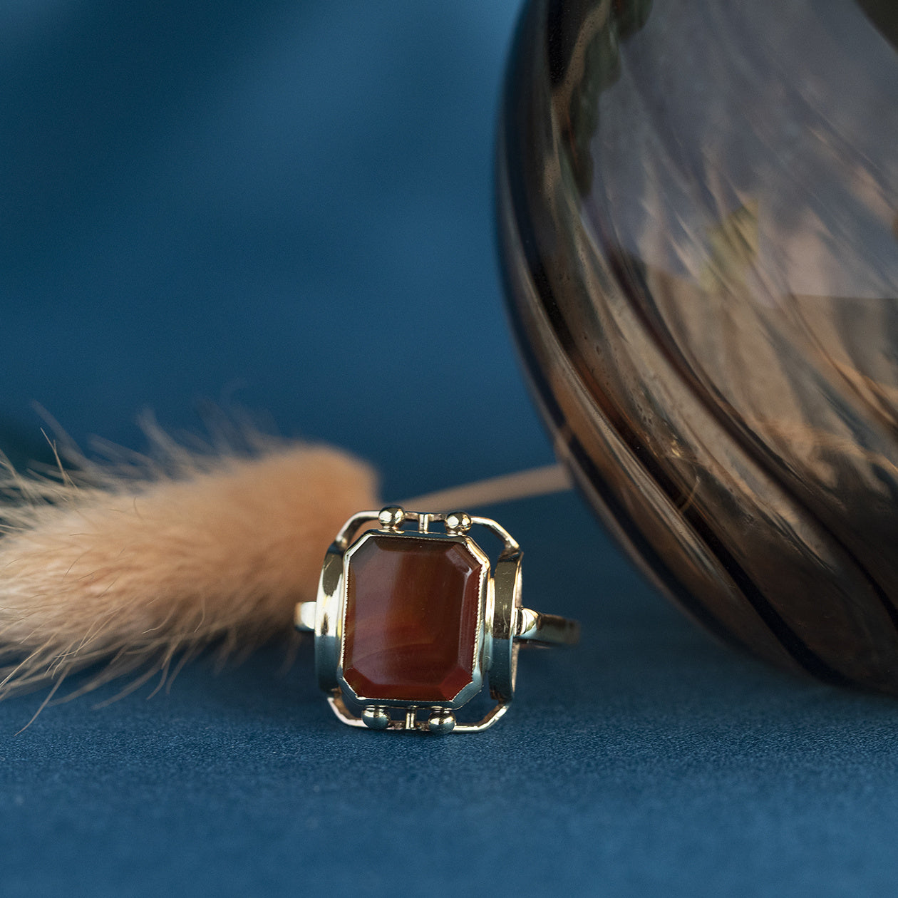 Ring met streepagaat 12 krt