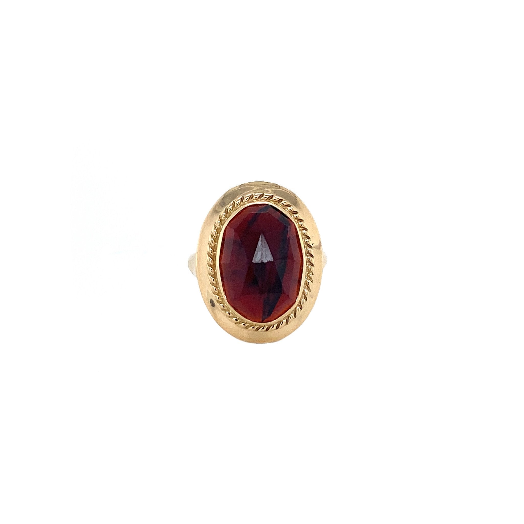 14 kt gold ring with garnet