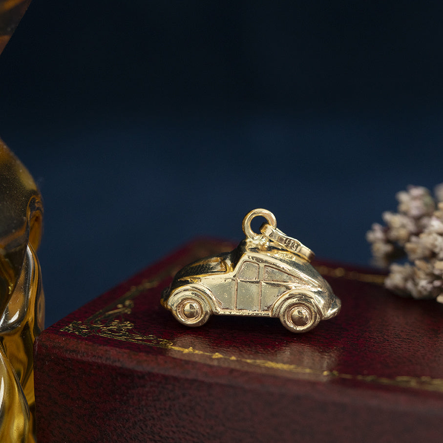 Golden vintage car pendant 14 kt