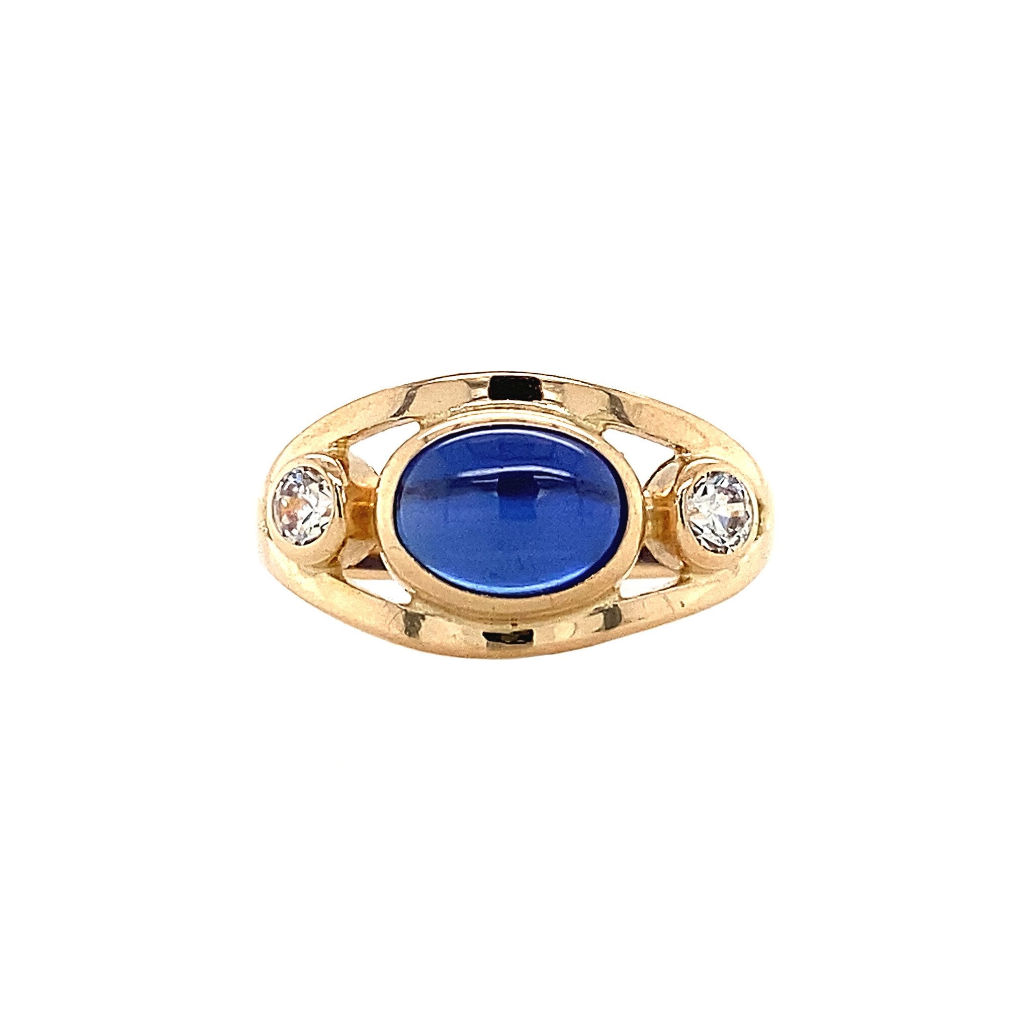 14 kt gold ring with sapphire and zirconia