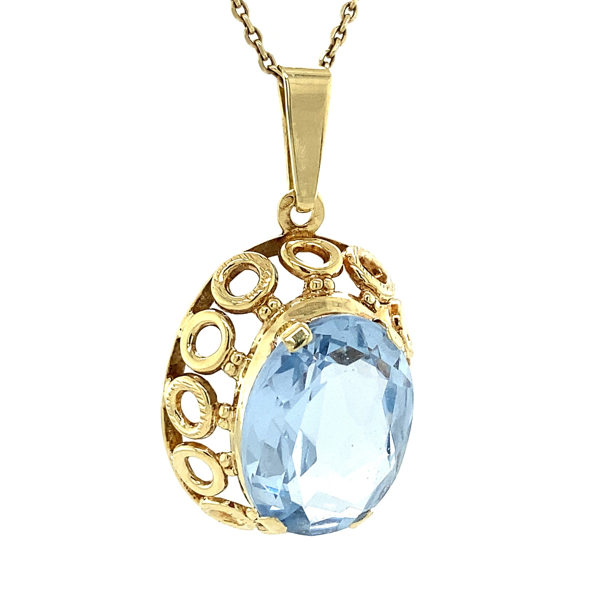 Gold pendant with blue spinel 14 kt