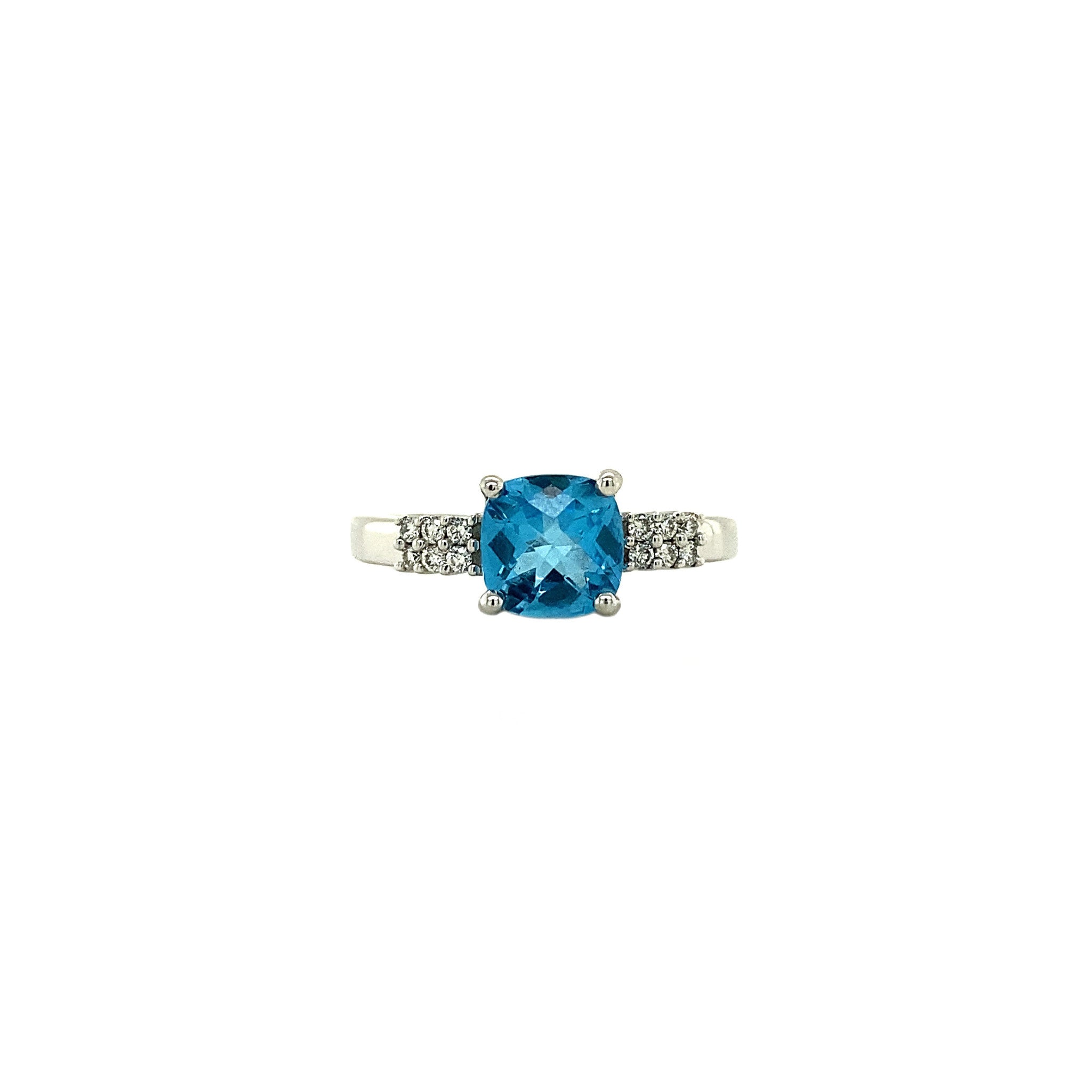 14 kt white gold ring with topaz and diamond