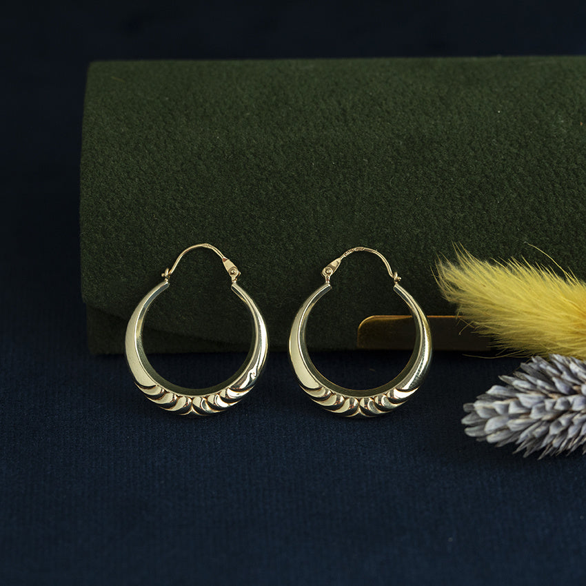 Vintage 14 kt gold fantasy hoop earrings