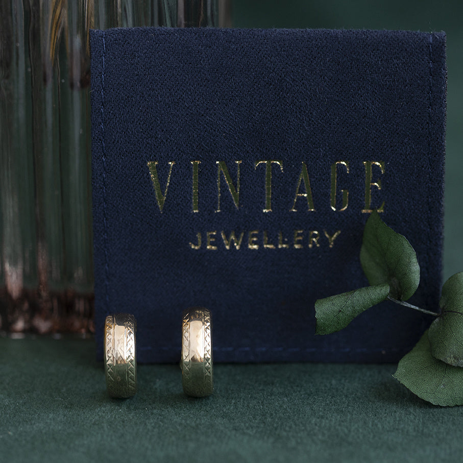 Gouden vintage fantasie oorringen 14 kt