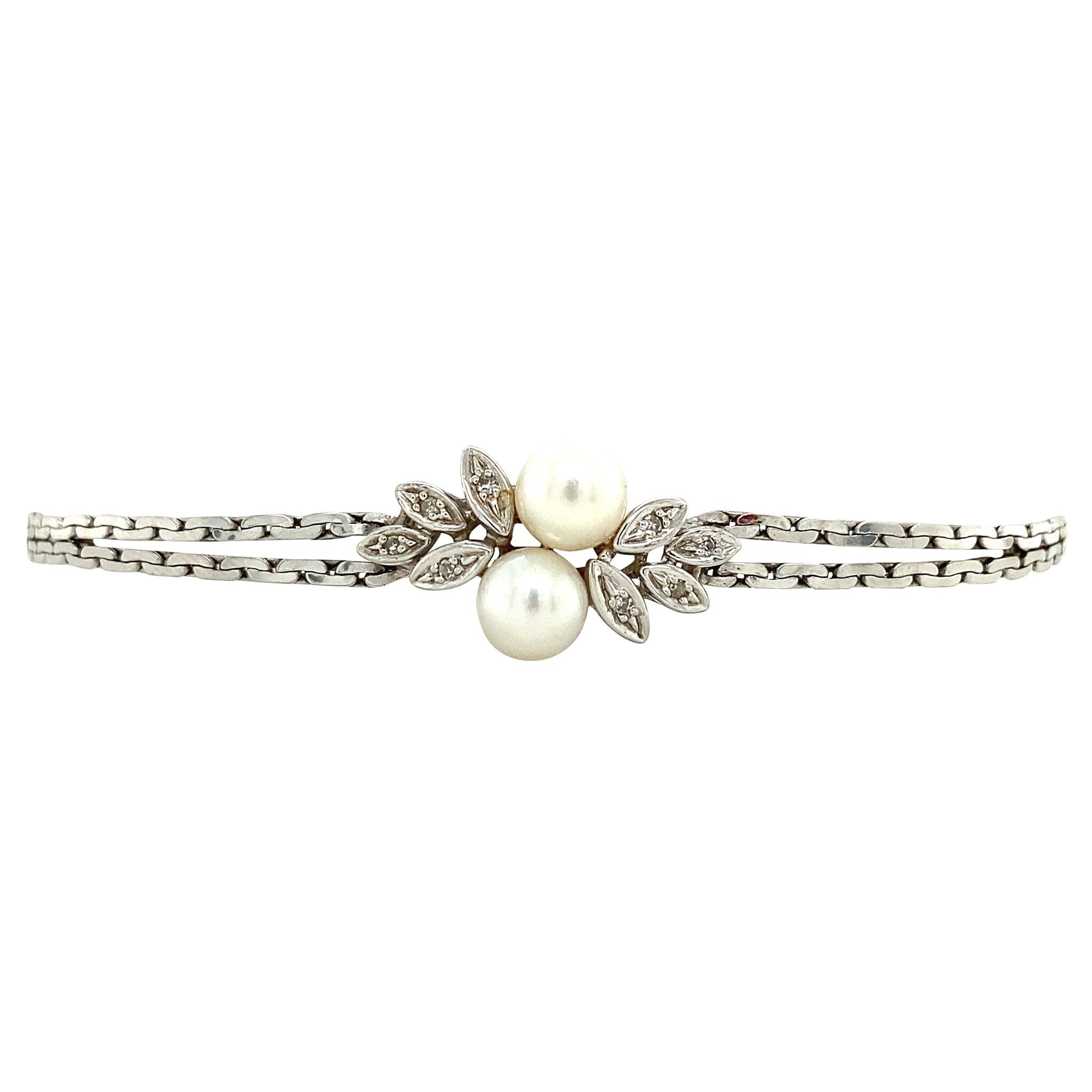 Vintage 14 kt white gold bracelet with diamond and pearl