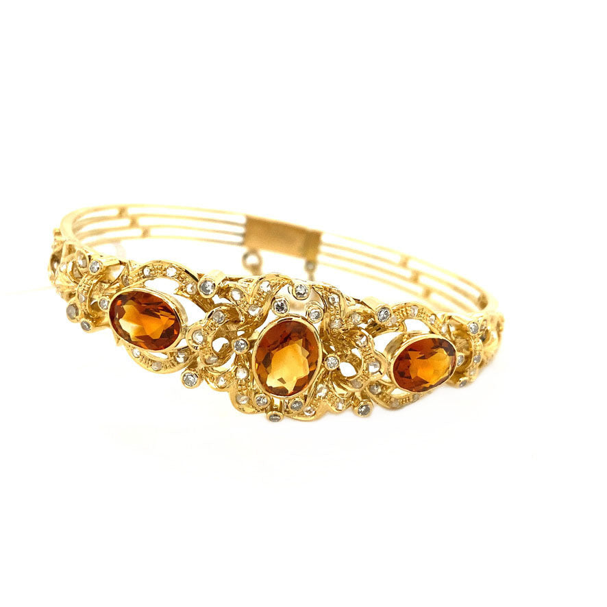 Gouden armband met citrien en diamant 14 krt