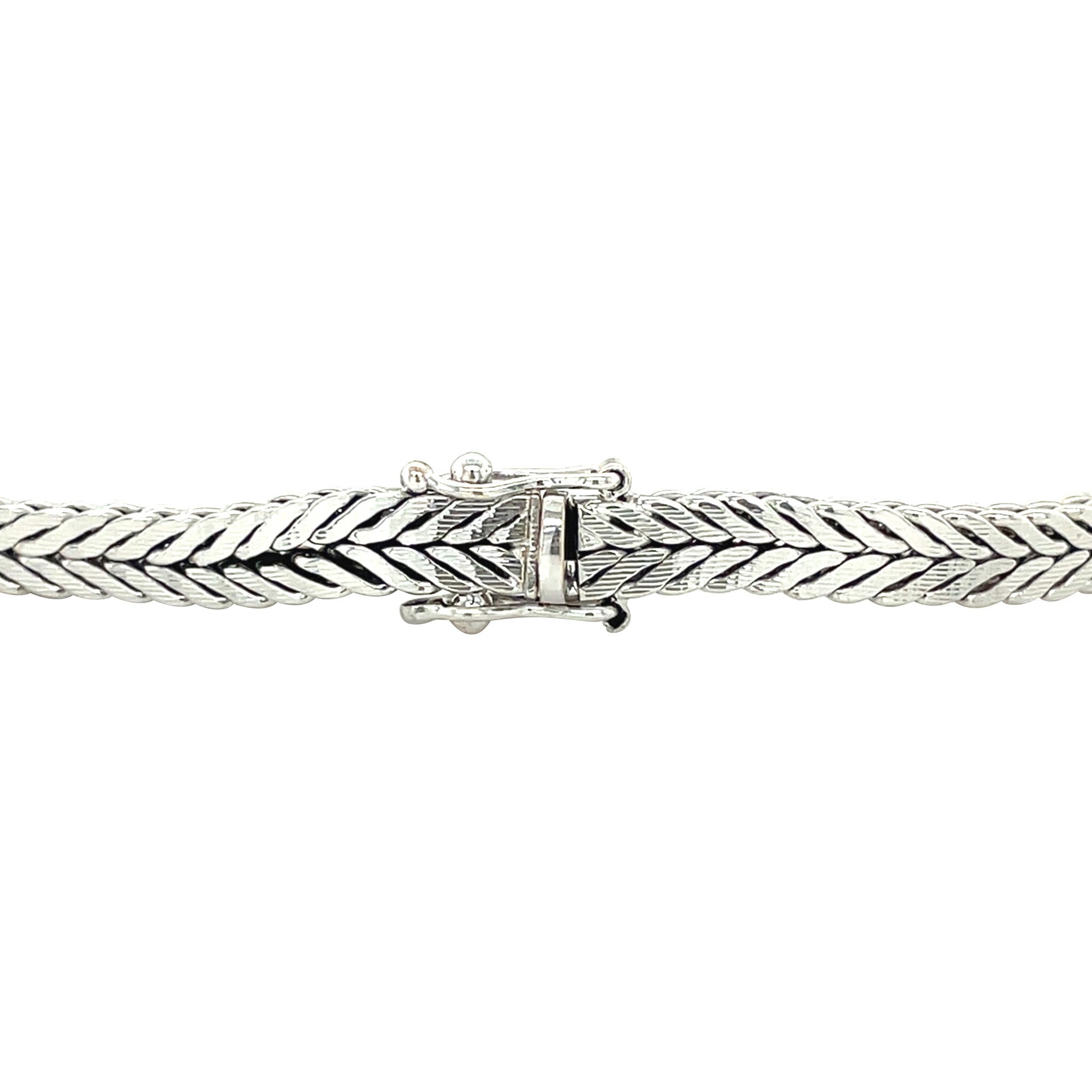 Vintage 14 kt white gold bracelet with a diamond