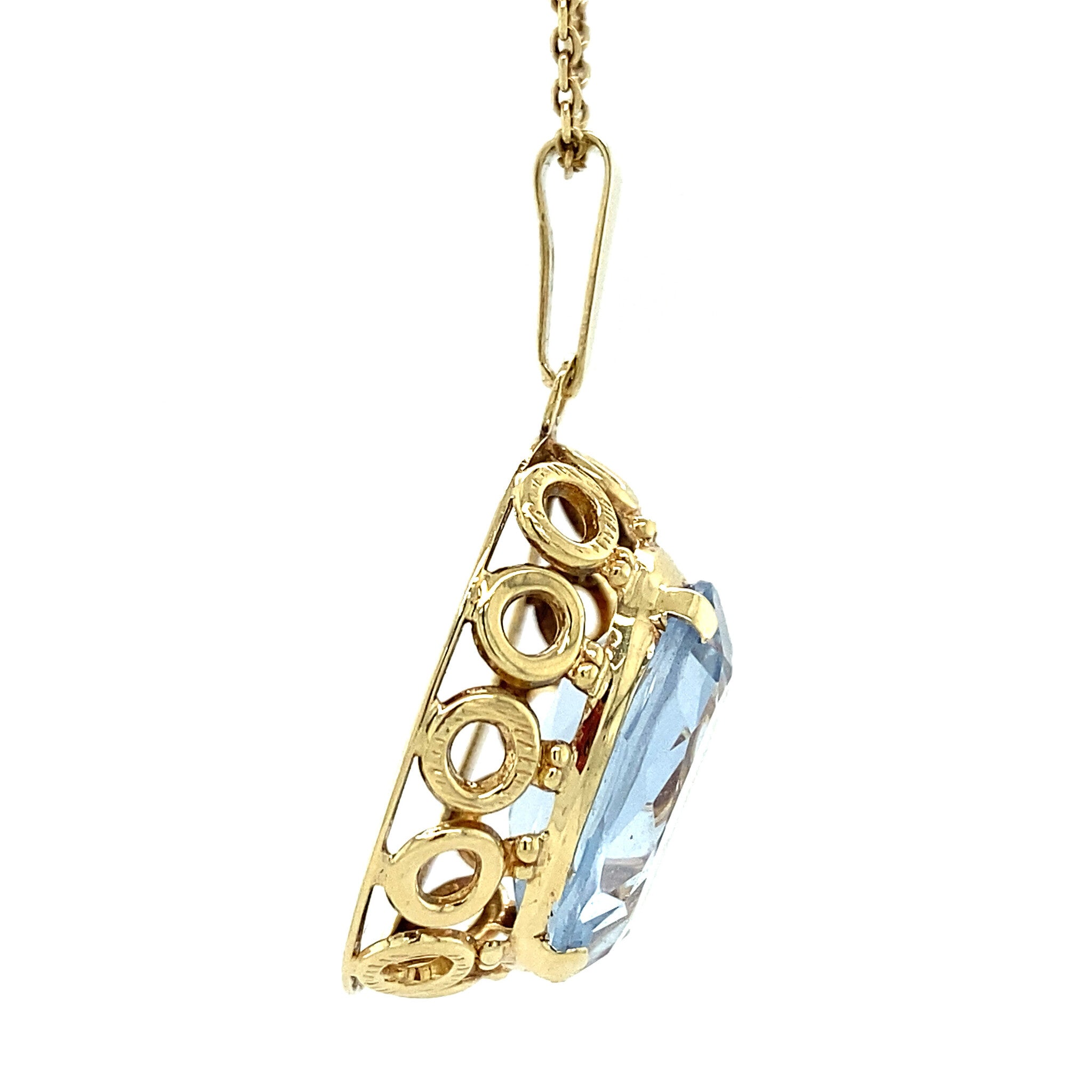 Gold pendant with blue spinel 14 kt
