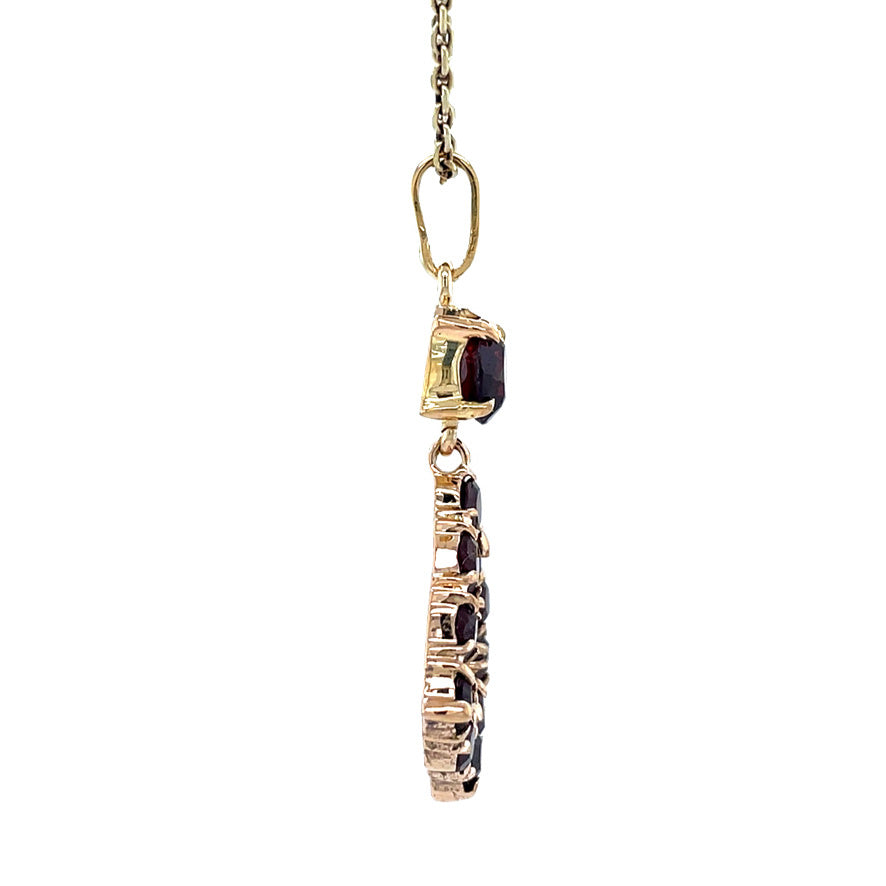 Gouden vintage hanger met granaat 18 krt
