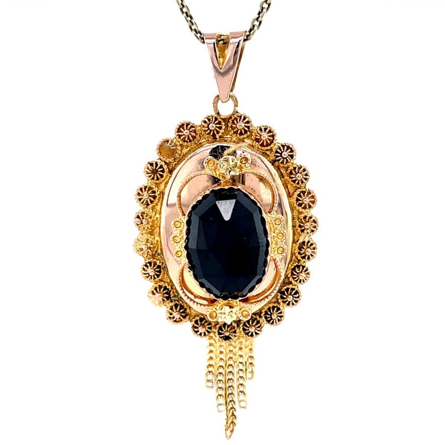 Gold vintage pendant with garnet 14 kt