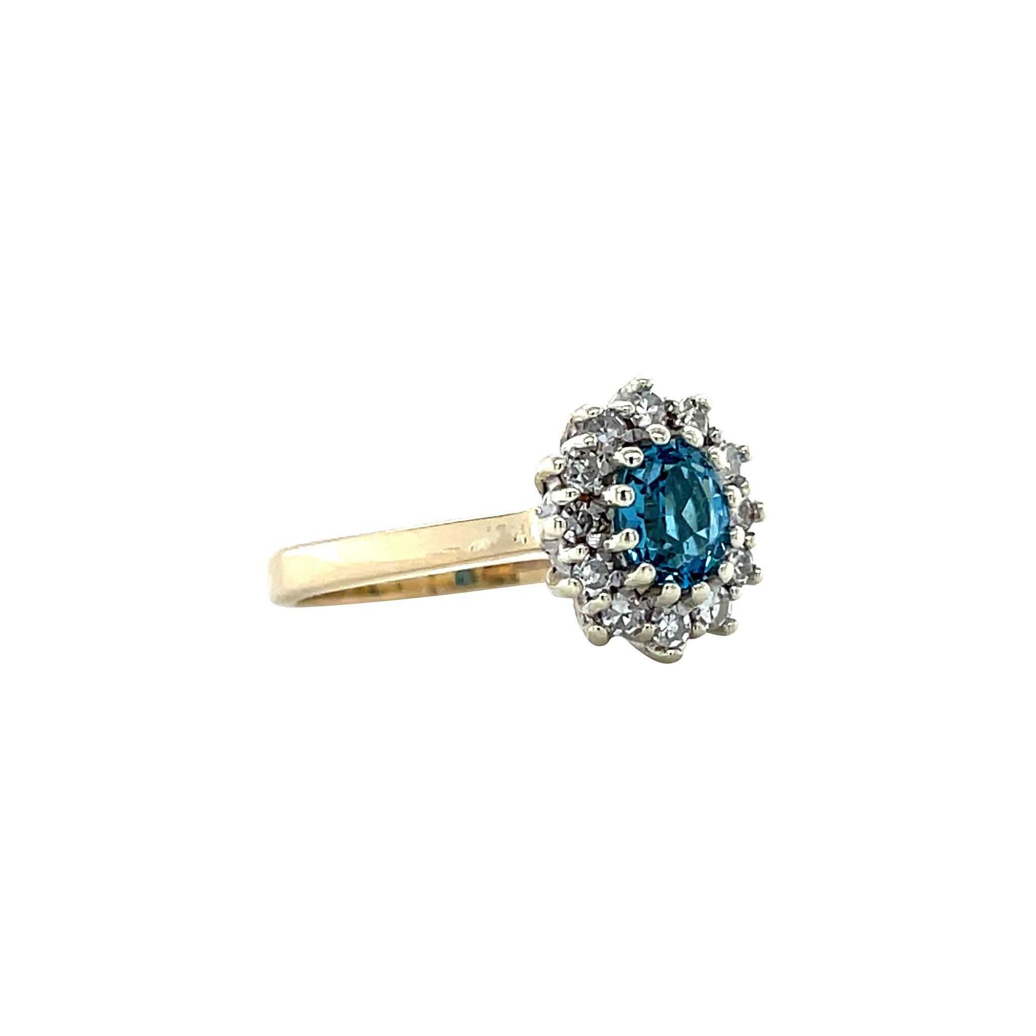 Vintage entourage ring met topaas en diamant 9 krt