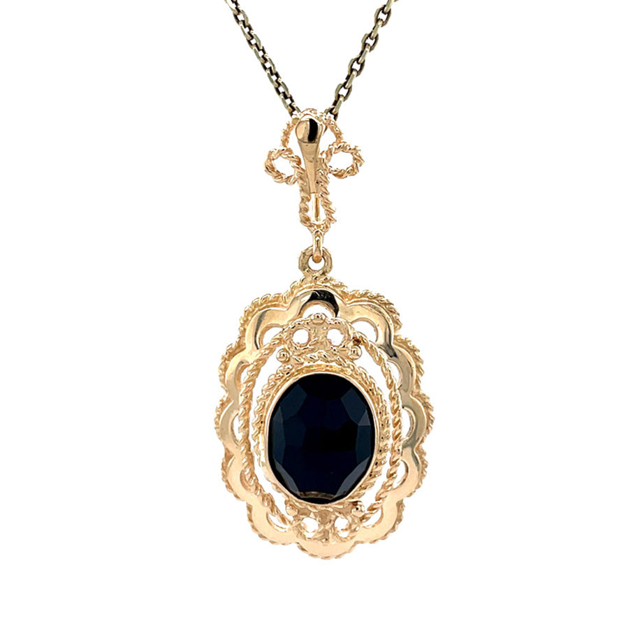 Gold vintage pendant with garnet 14 kt