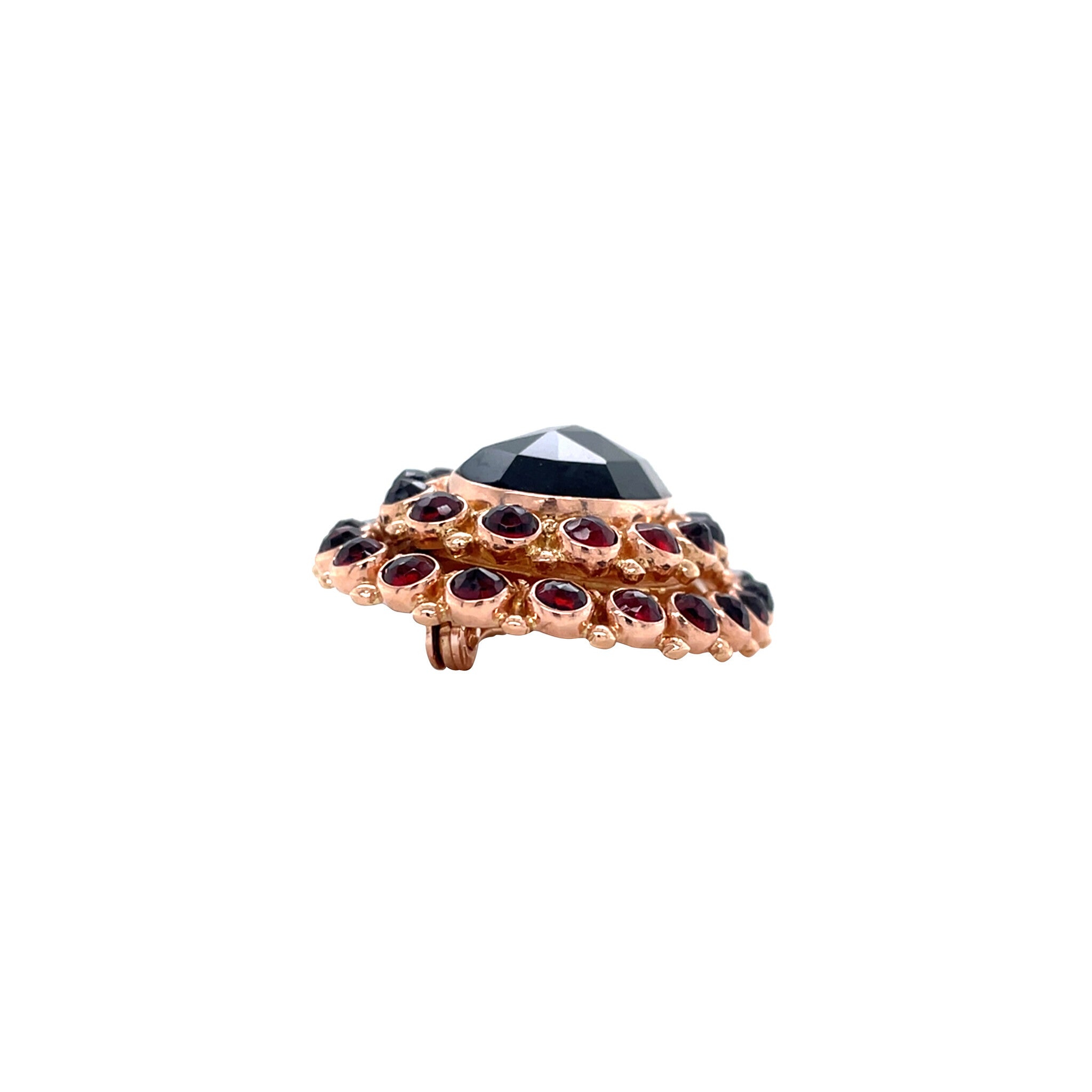 Vintage 14 kt gold entourage brooch with garnet