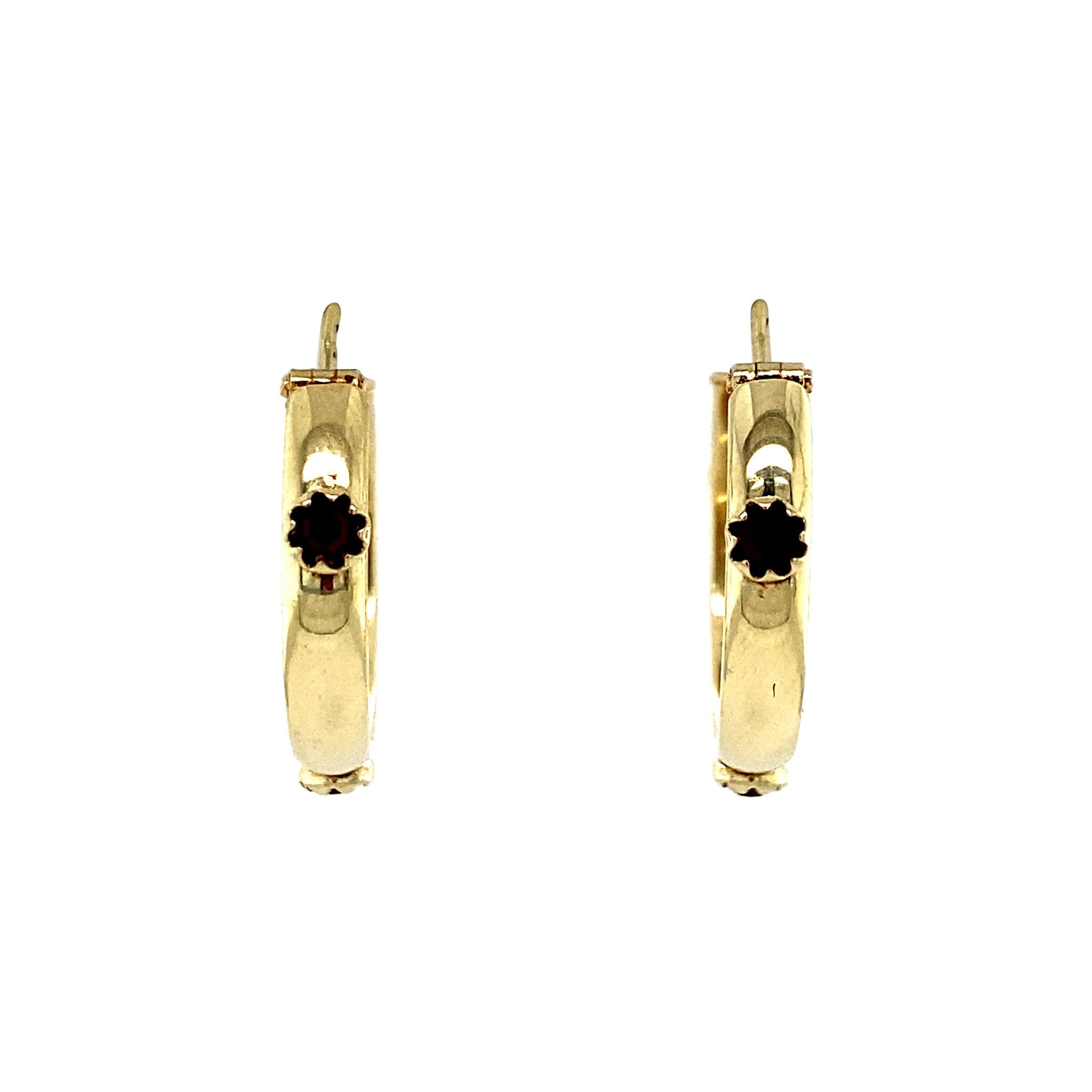 14 kt gold earrings with colored gemstone