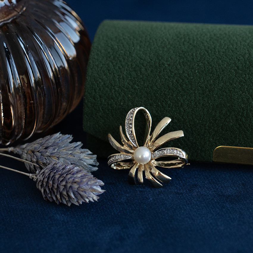 Vintage broche met parel en diamant 8 krt