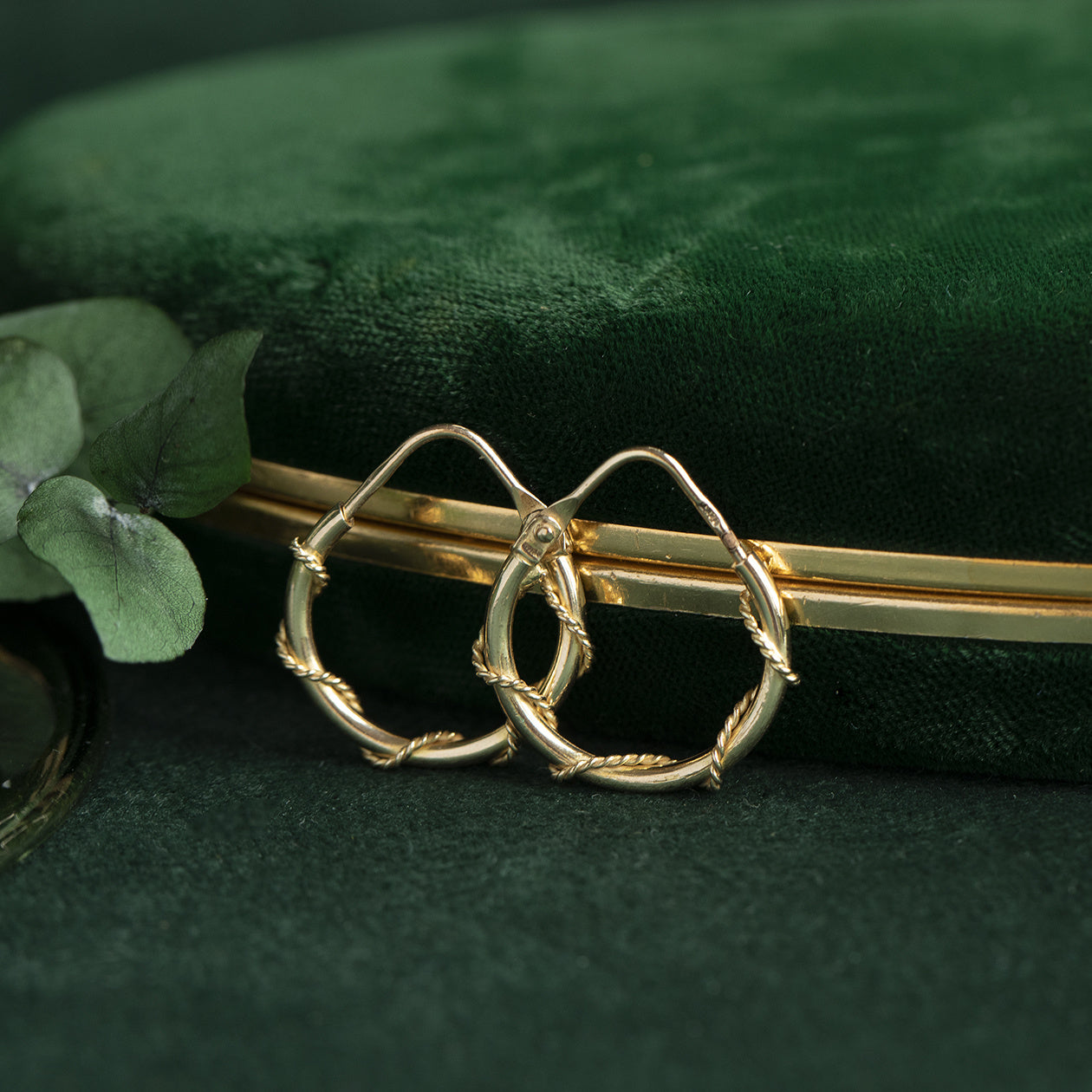 Gouden fantasie oorringen 14 krt