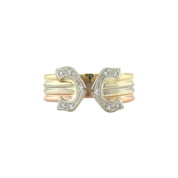 Tricolour vintage 14 kt gold ring with a diamond