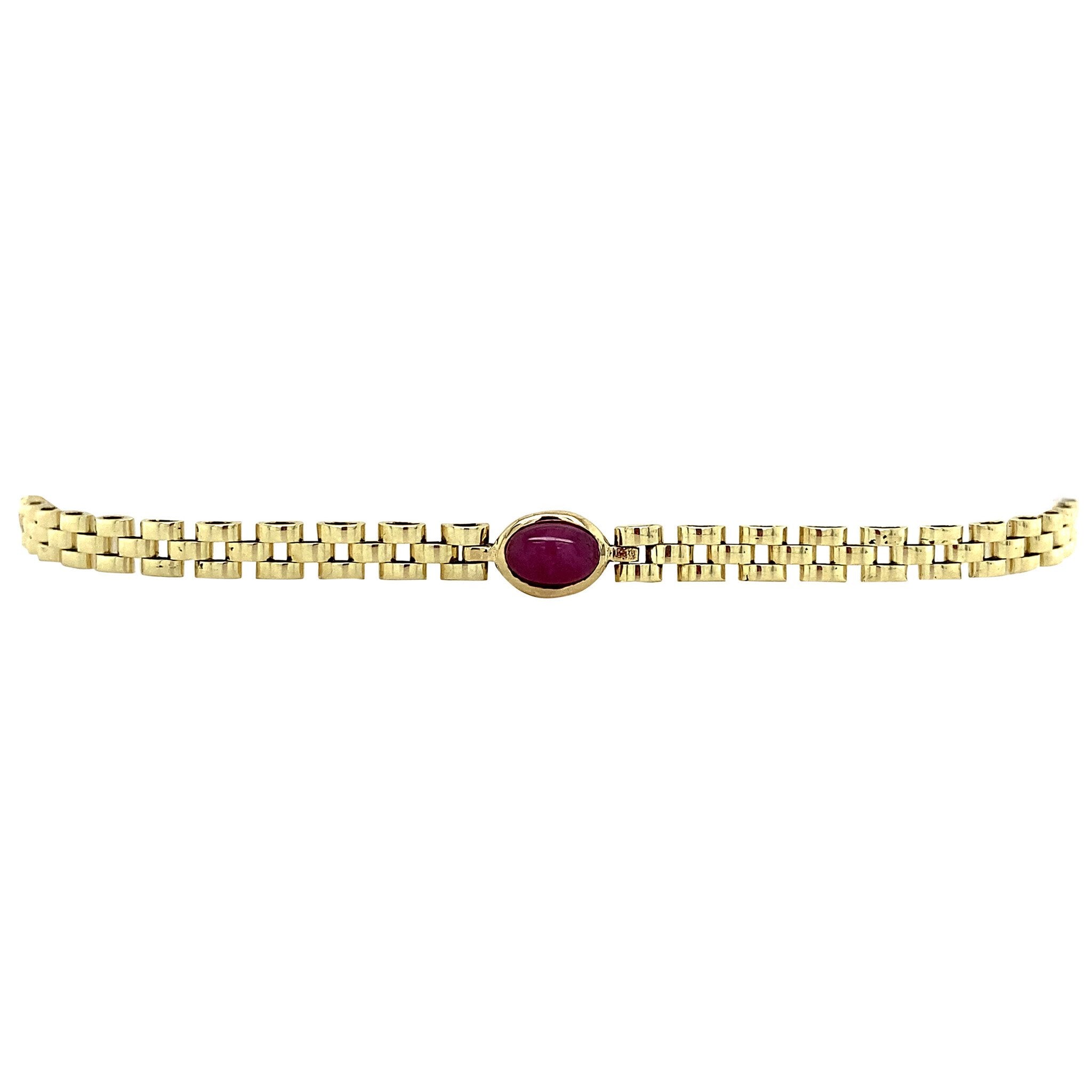 Gold bracelet bismarkt with ruby, sapphire and emerald 19 cm 14 krt