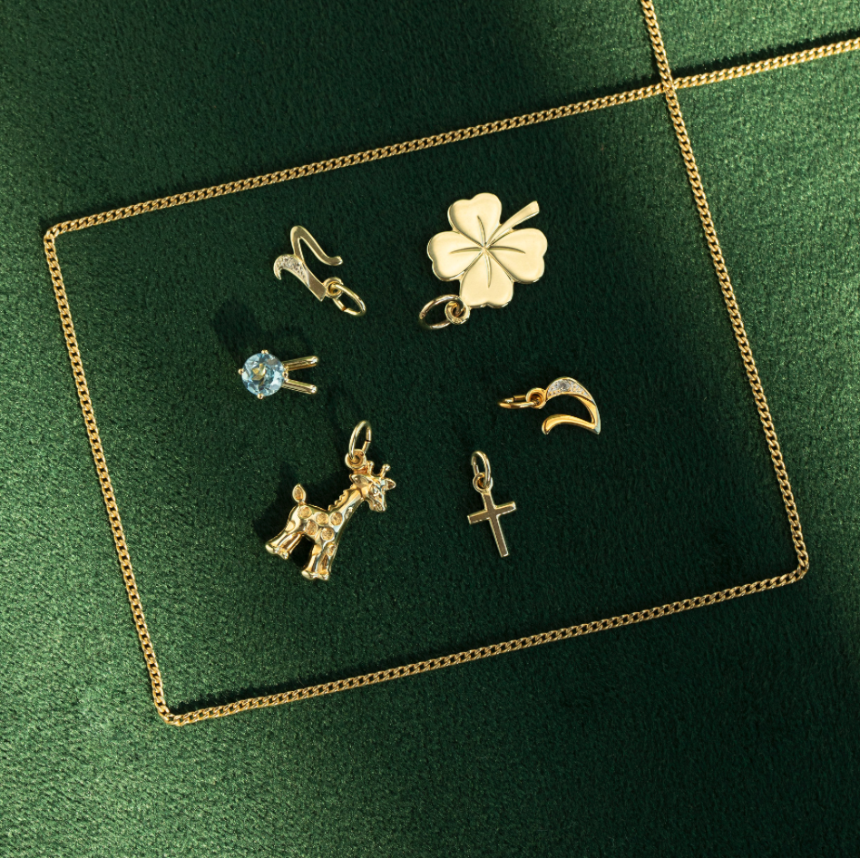 Gold giraffe pendant 14 krt