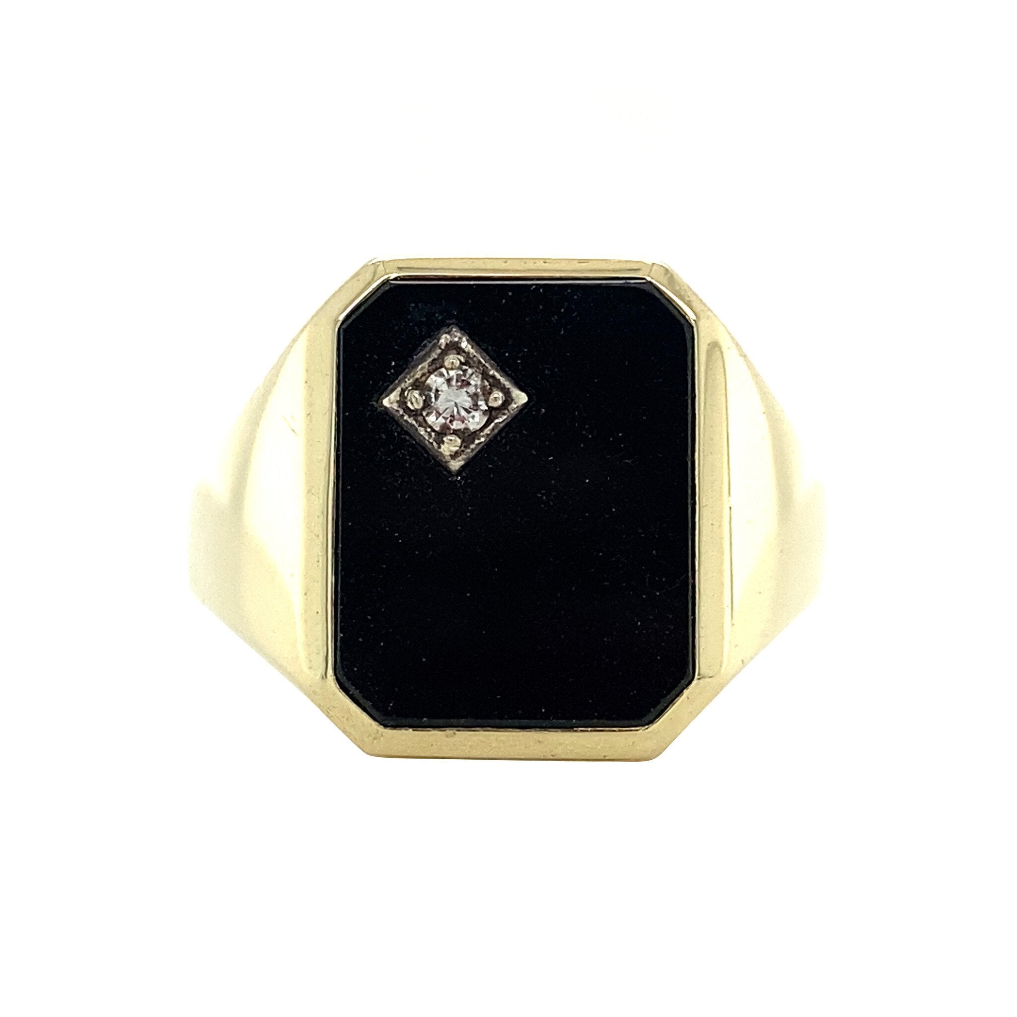 Gold signet ring with onyx and diamond, 14 kt