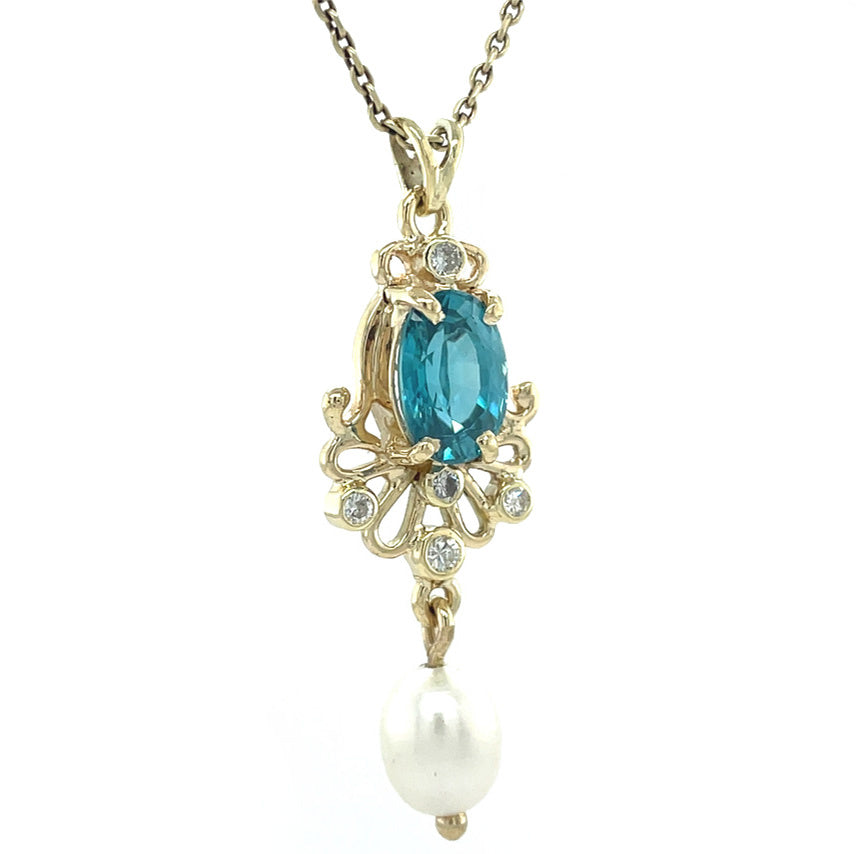 Gold vintage pendant with pearl, zirconia and diamond 14 kt