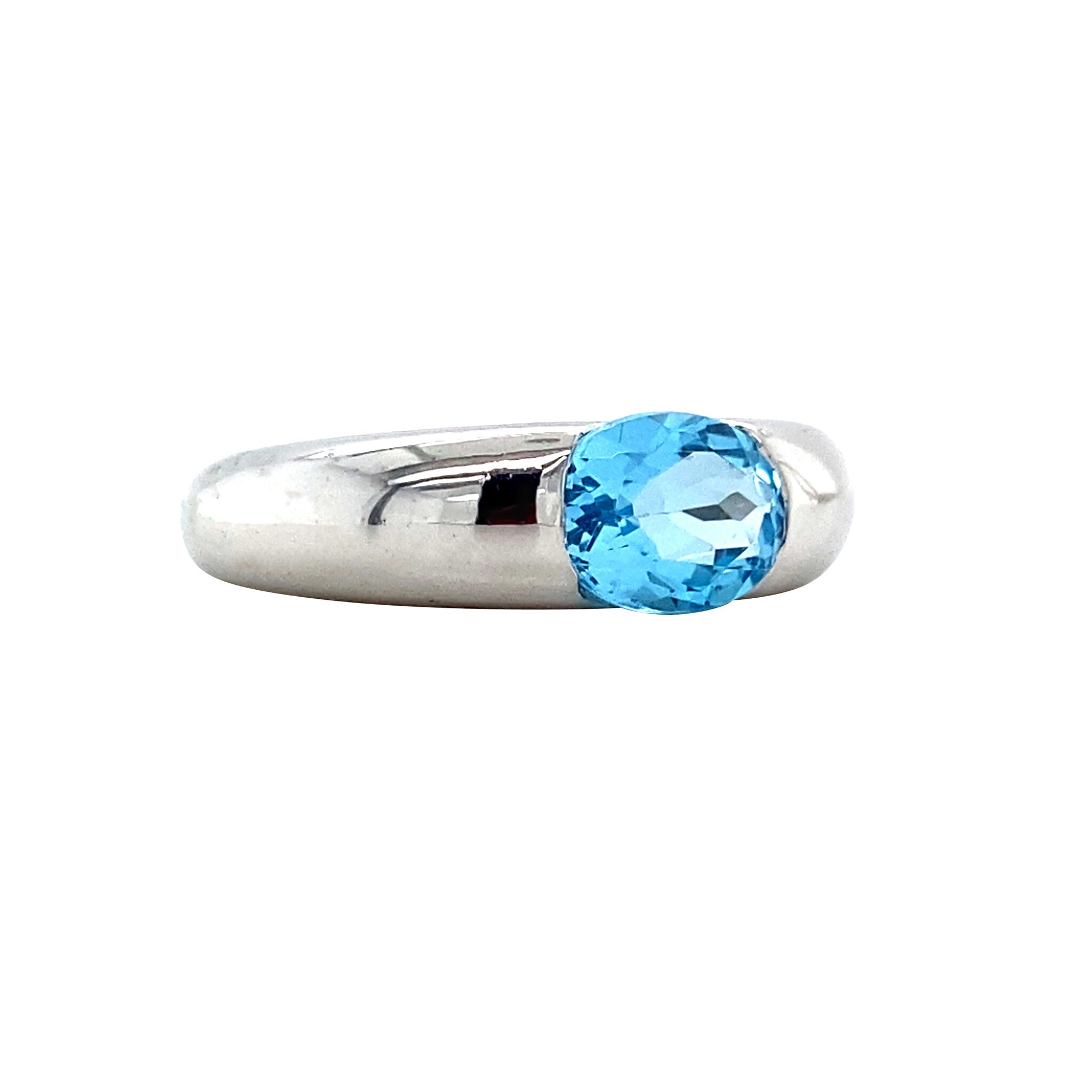 White gold ring with topaz 14 kt