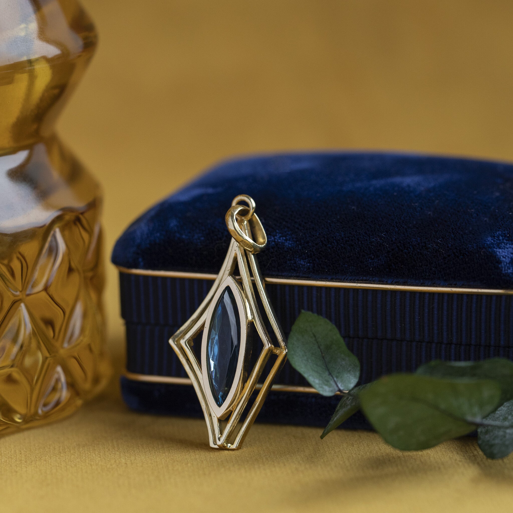 Gouden hanger met topaas 18 krt