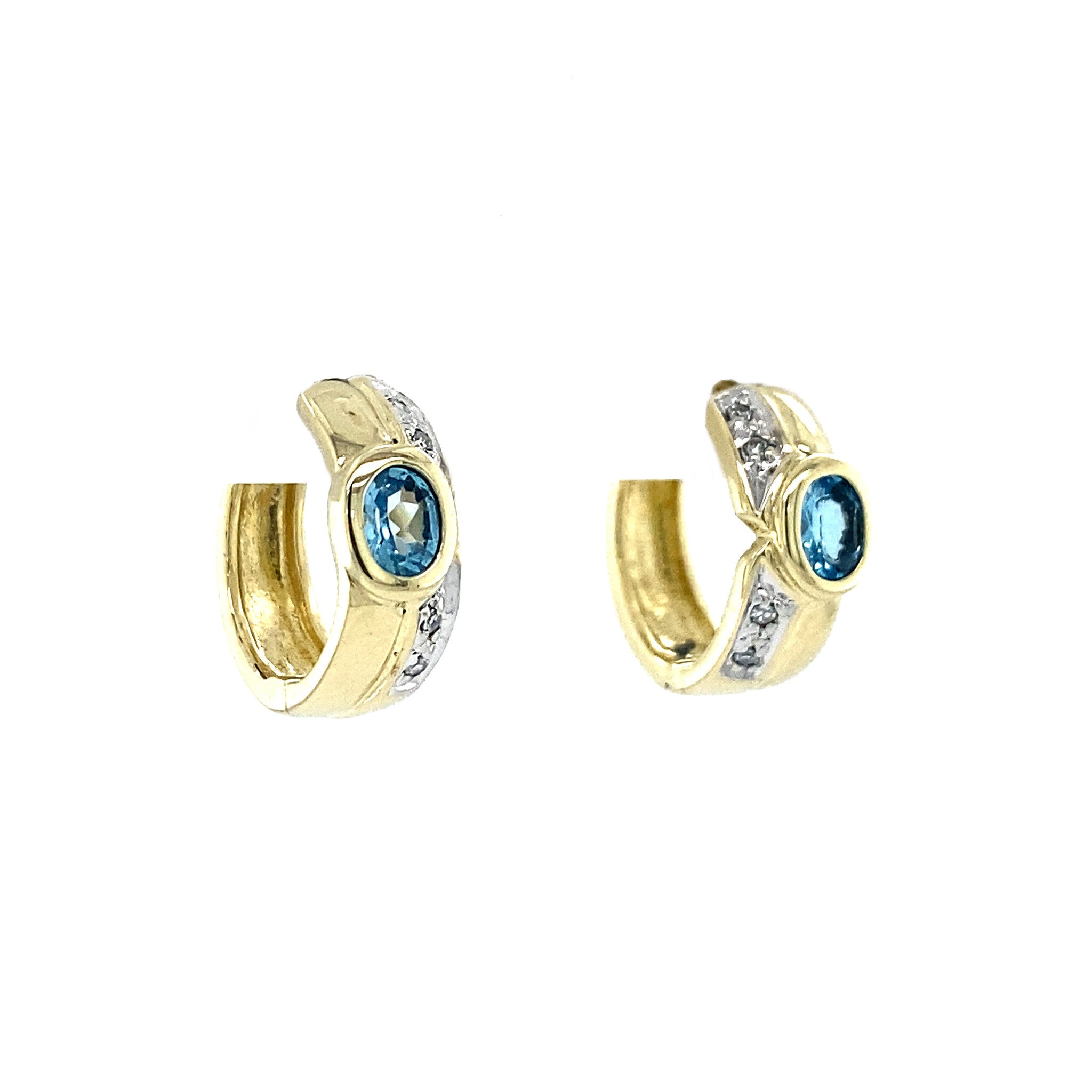 Gold hoop earrings with diamond and topaz, 14 kt