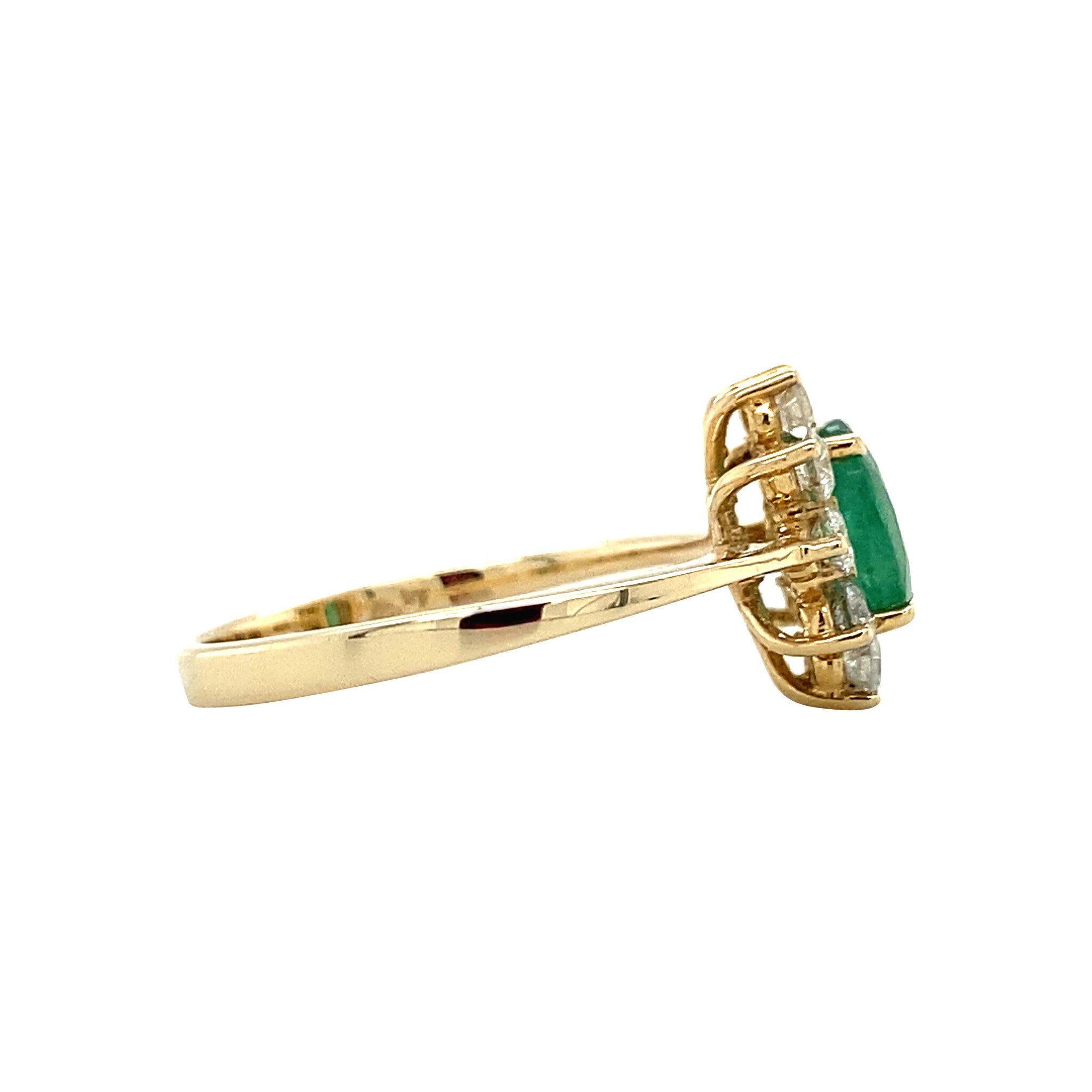 14 kt gold halo ring with emerald and diamond