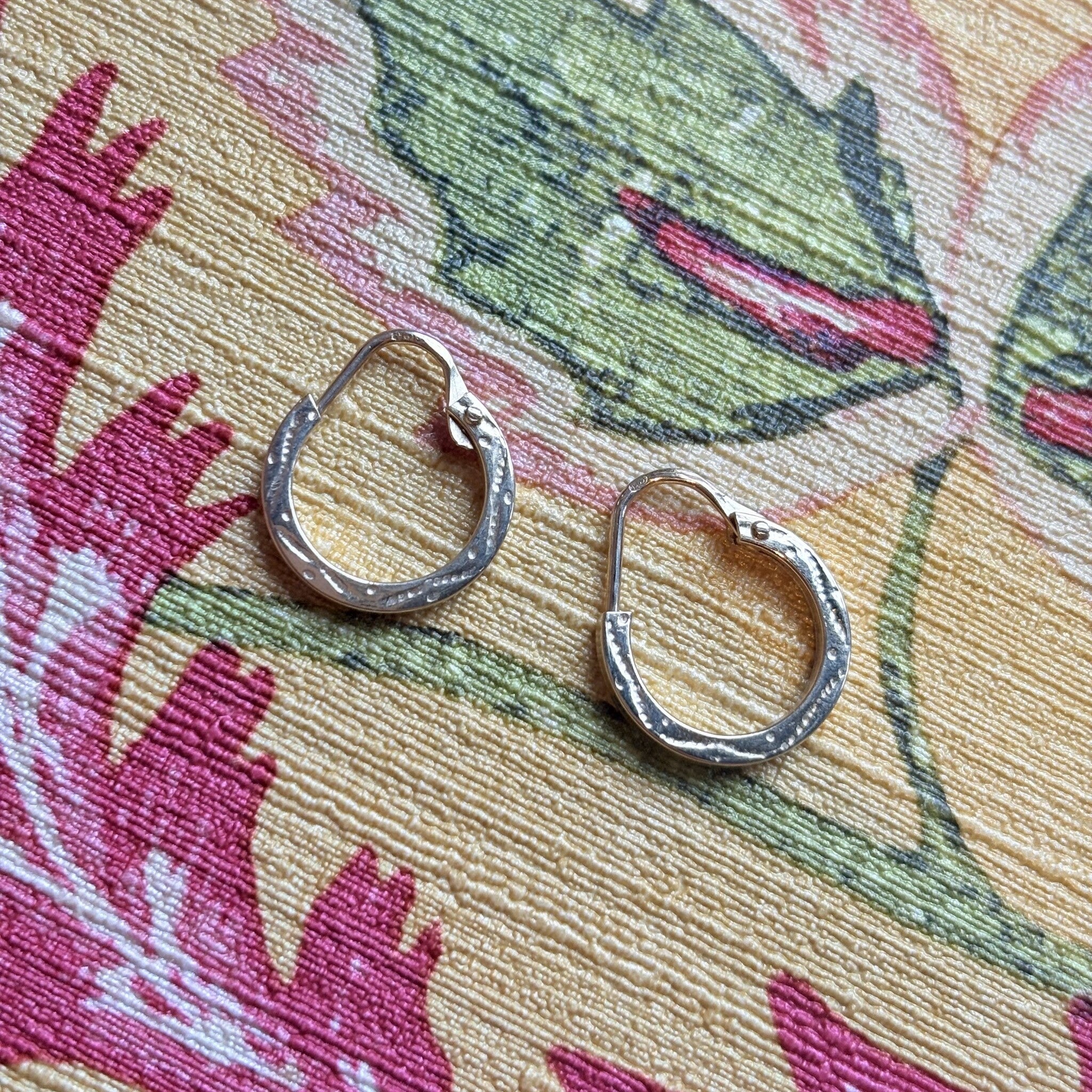 14 kt gold fantasy hoop earrings