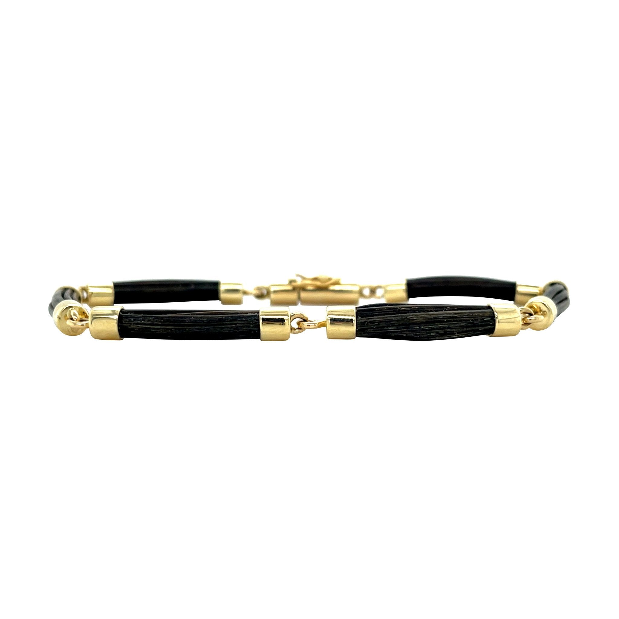 Gouden vintage armband met olifanten haar 14 kt
