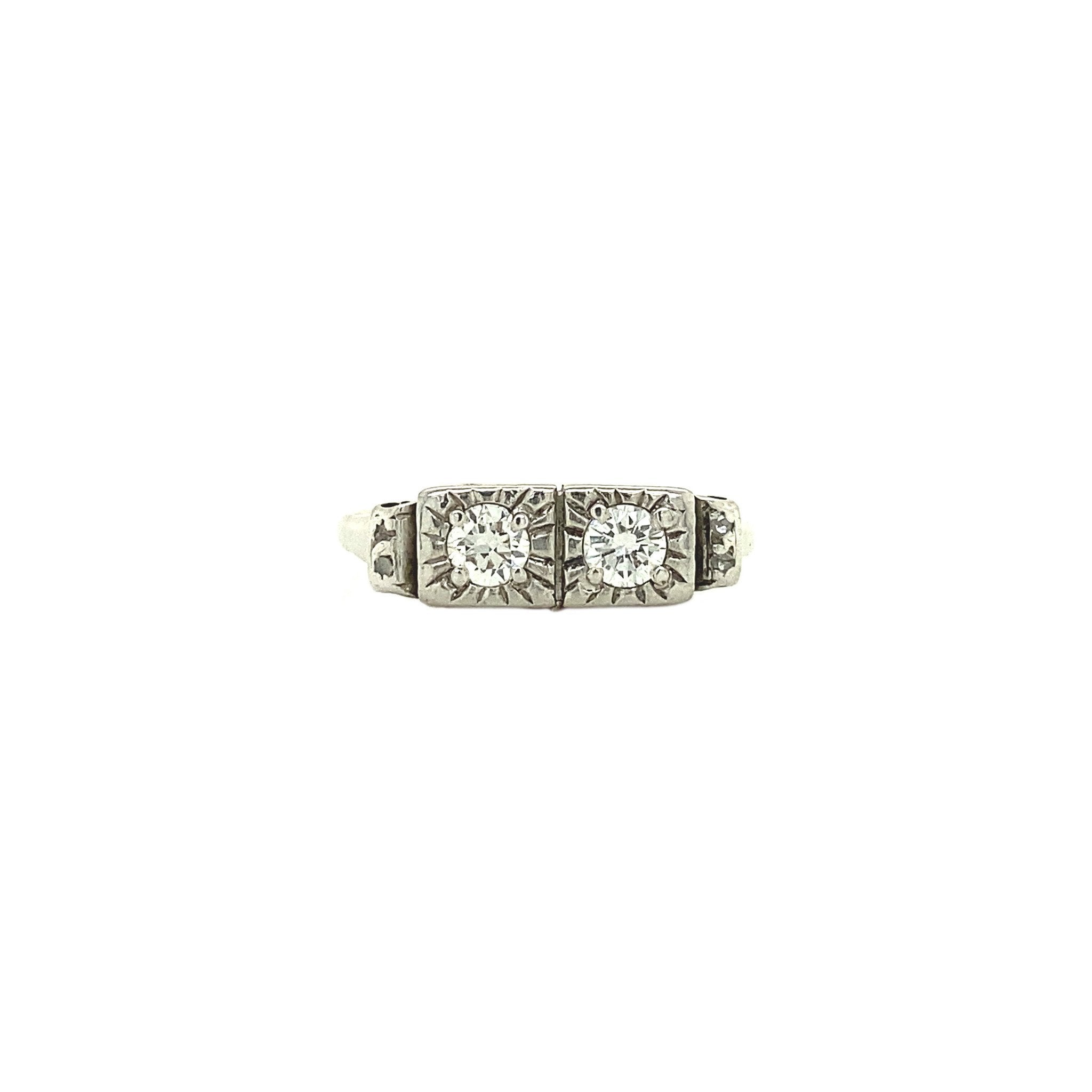 14 kt white gold ring with diamond