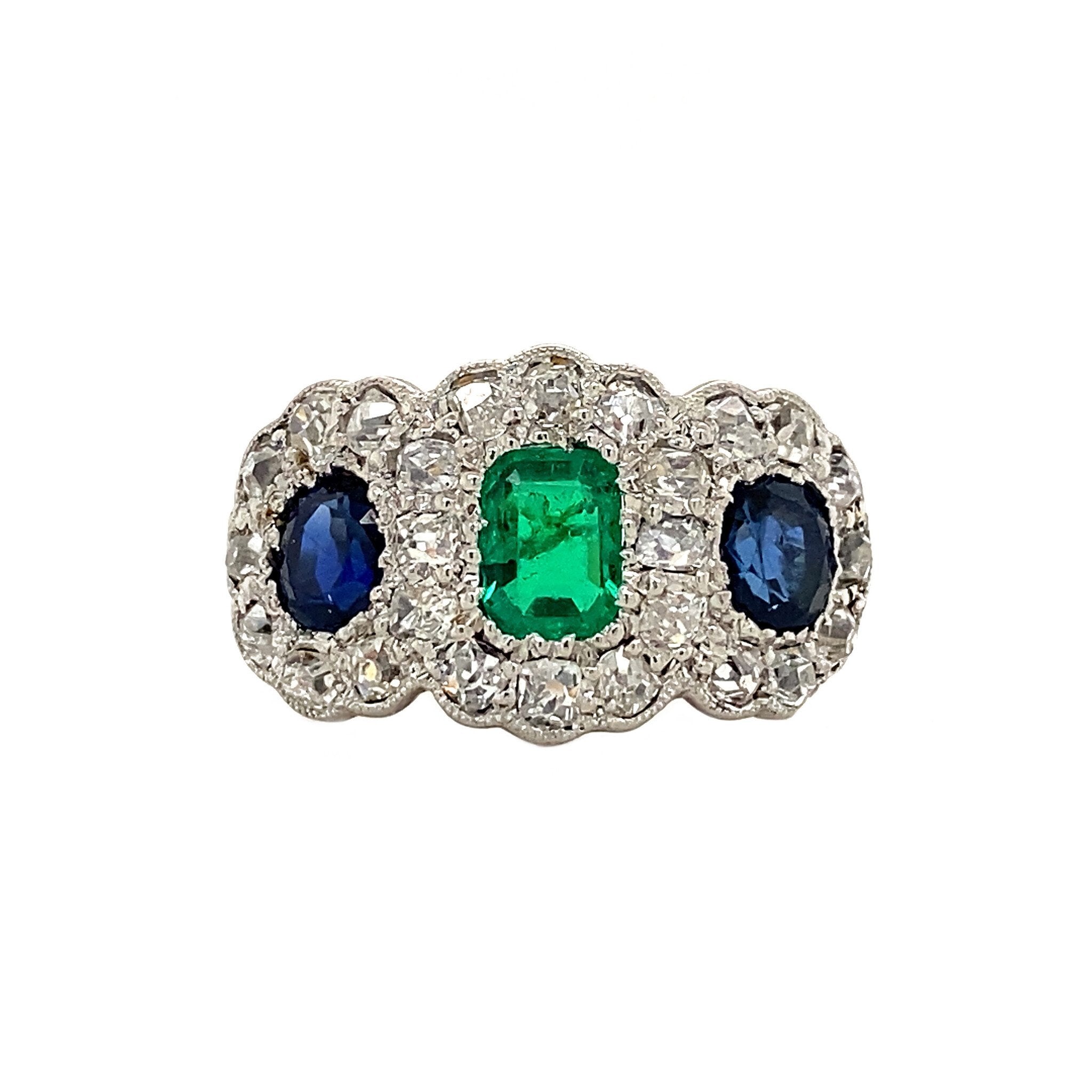 18 kt gold ring with emerald, sapphire and diamond